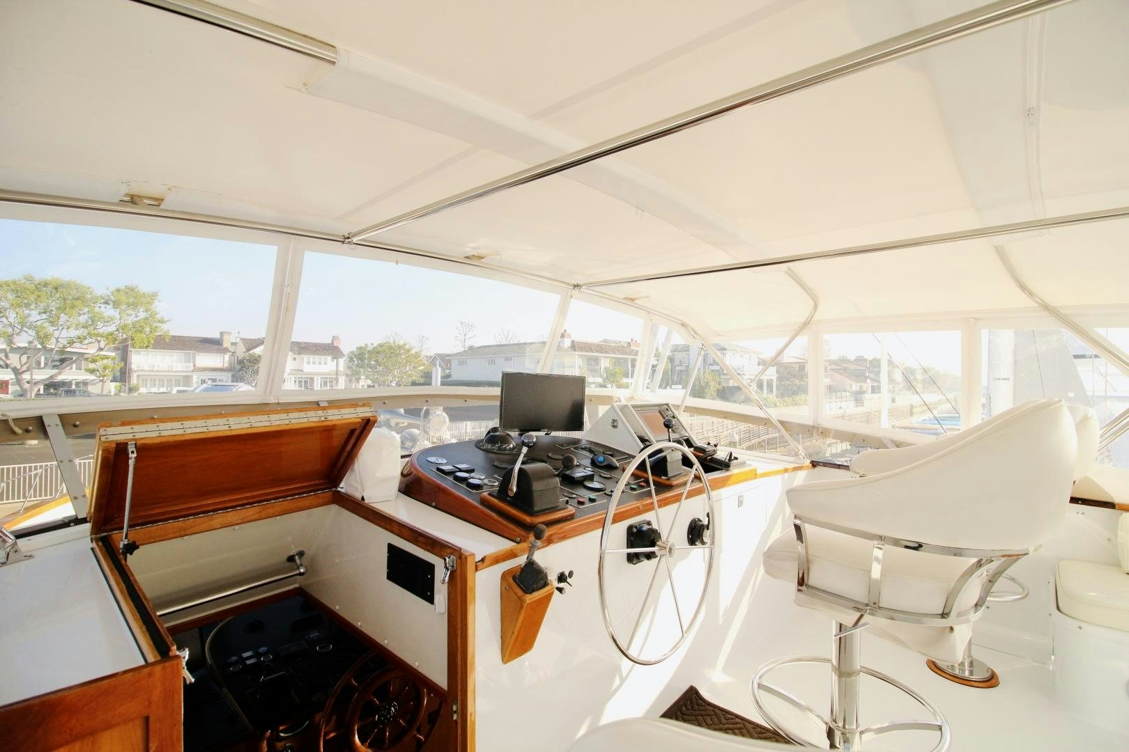 a room with a table and chairs aboard REFLECTIONS Yacht for Sale