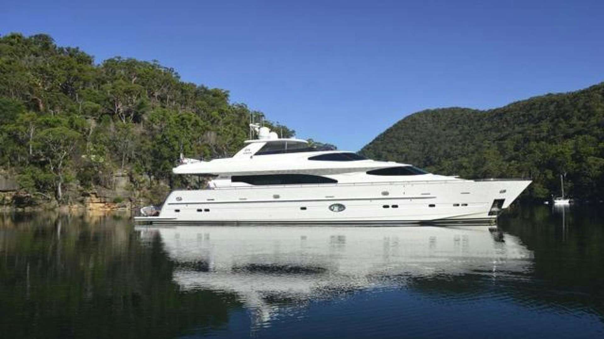 a yacht on the water aboard ENCORE Yacht for Sale