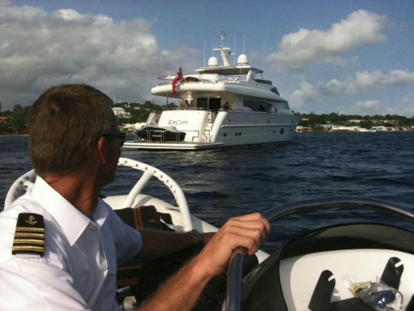 a man on a boat aboard ENCORE Yacht for Sale