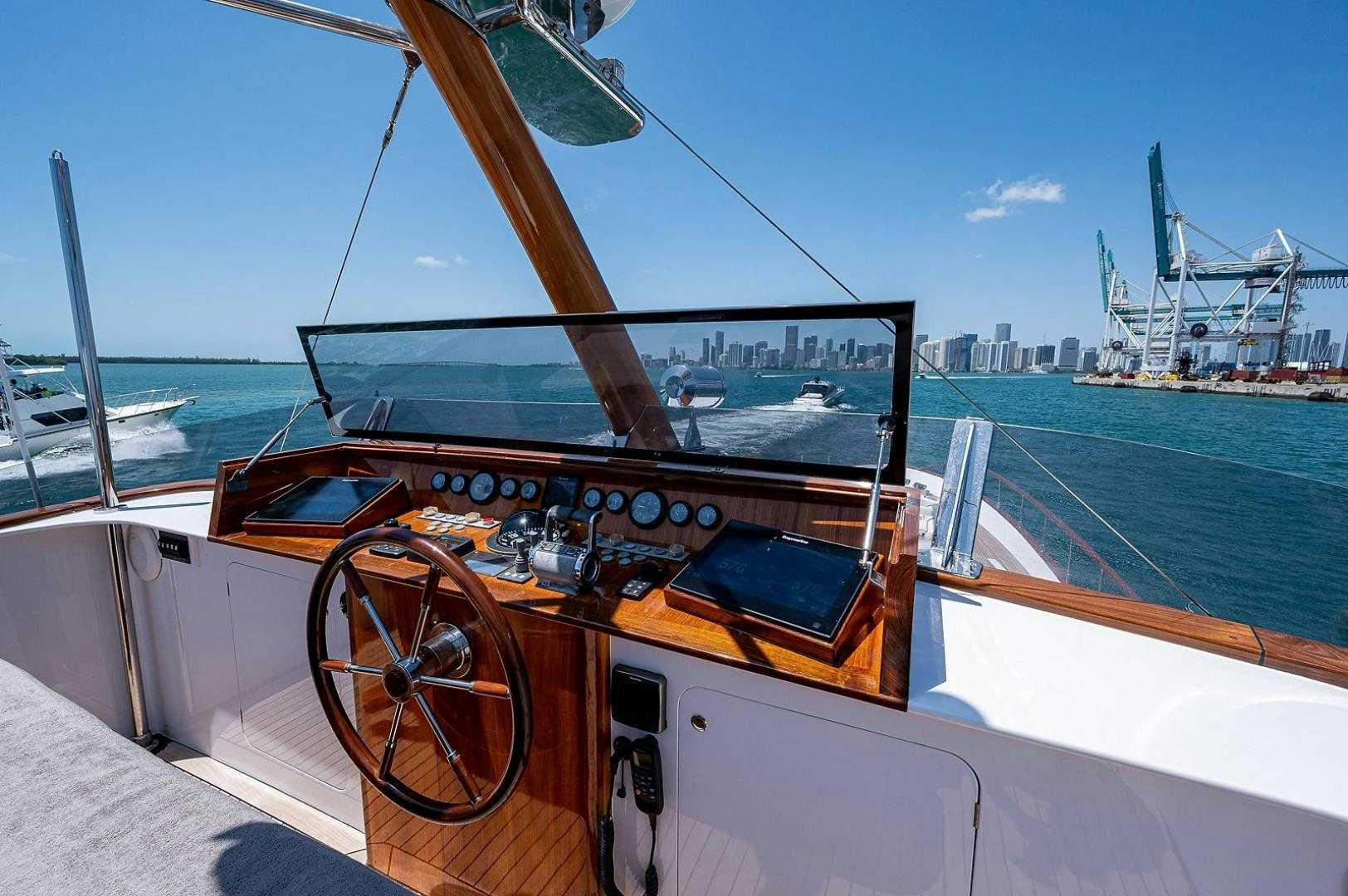 a boat with a steering wheel aboard ATALI Yacht for Sale