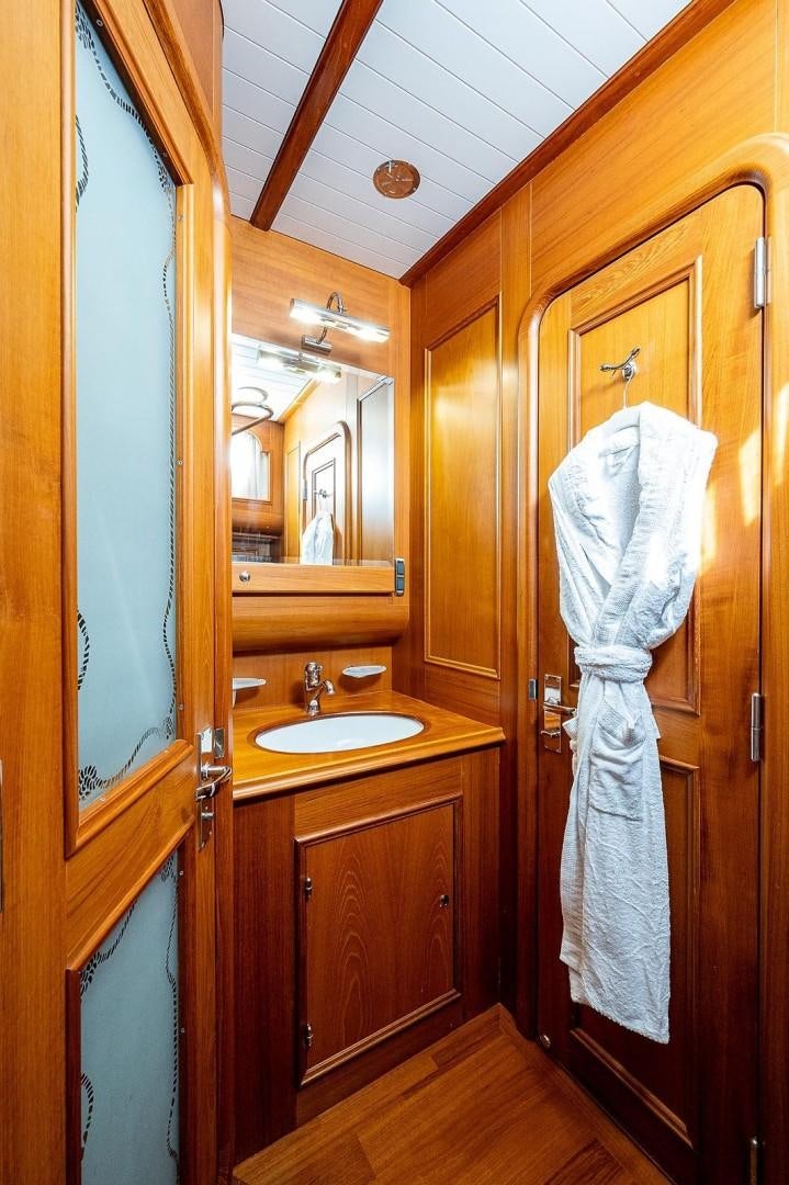 a bathroom with a towel on the wall aboard ATALI Yacht for Sale
