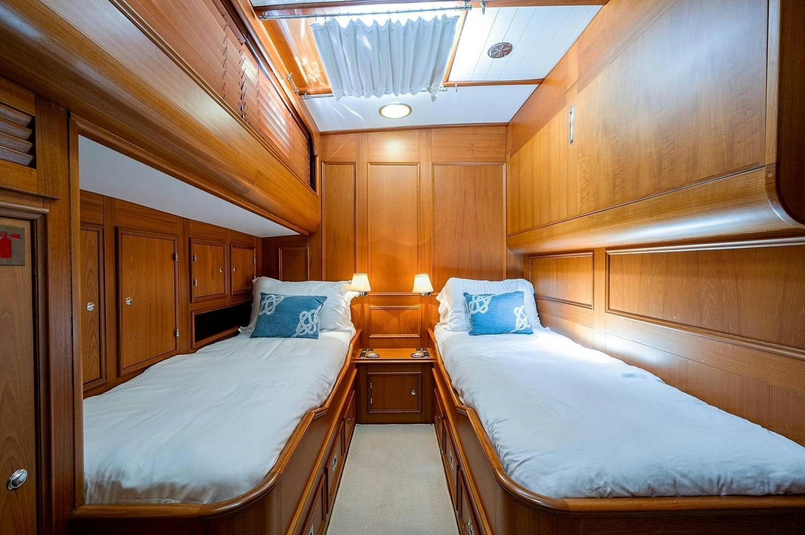 a room with two beds aboard ATALI Yacht for Sale