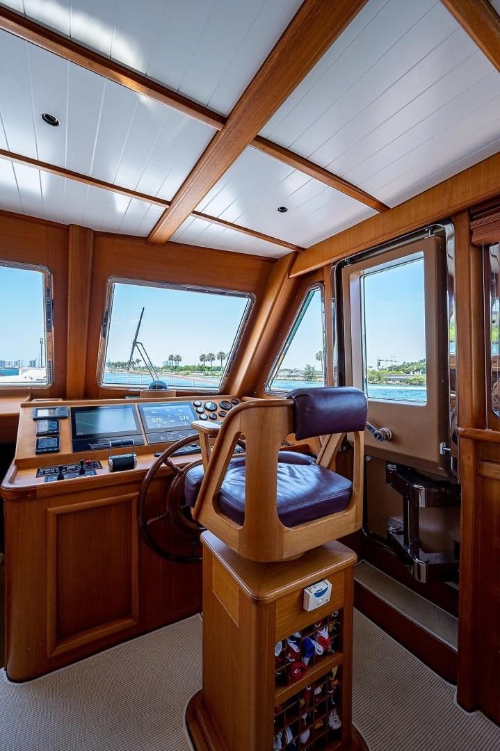 a room with a desk and computer aboard ATALI Yacht for Sale