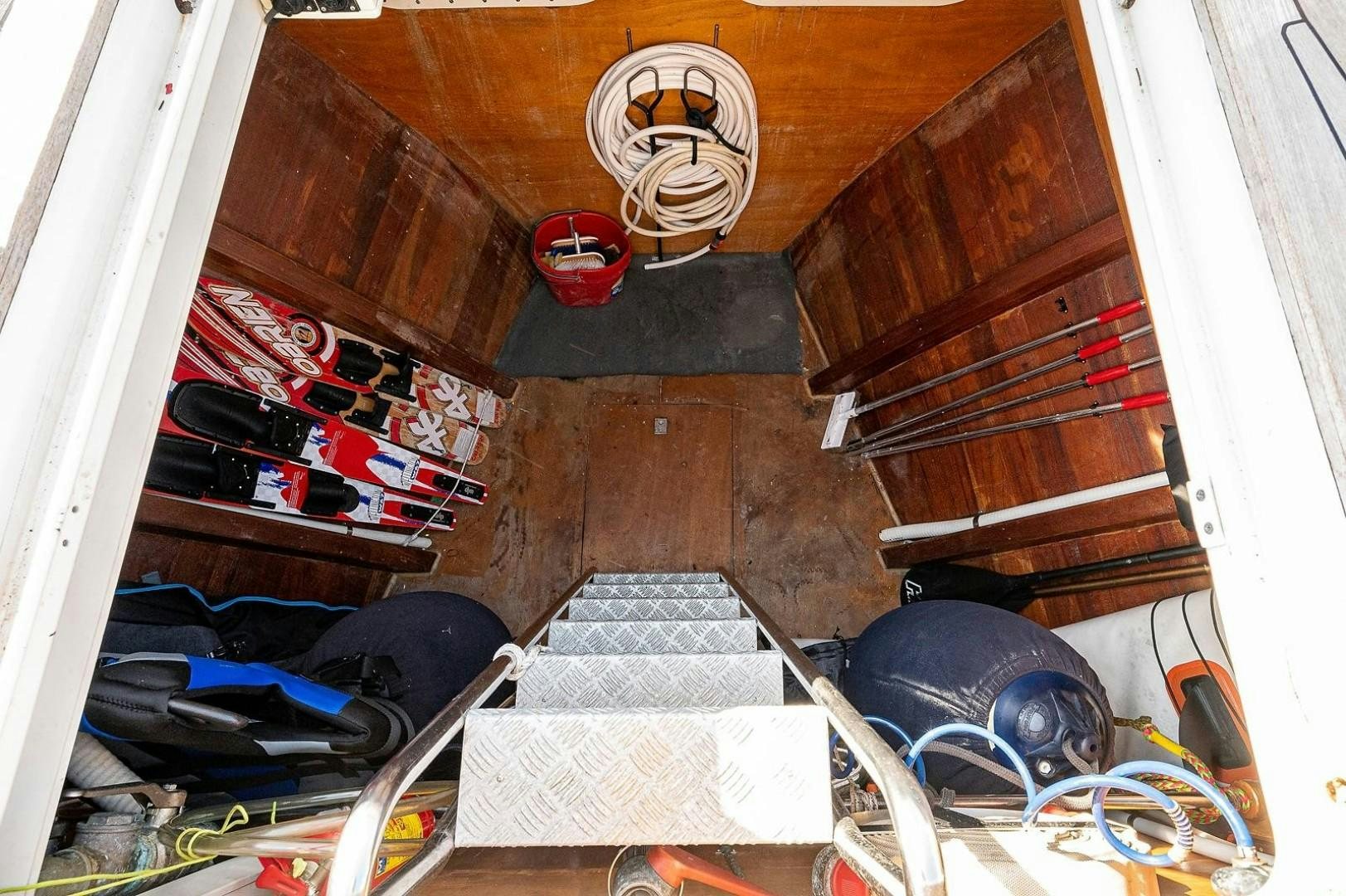 a room with a fan and a pile of clothes and a fan aboard ATALI Yacht for Sale