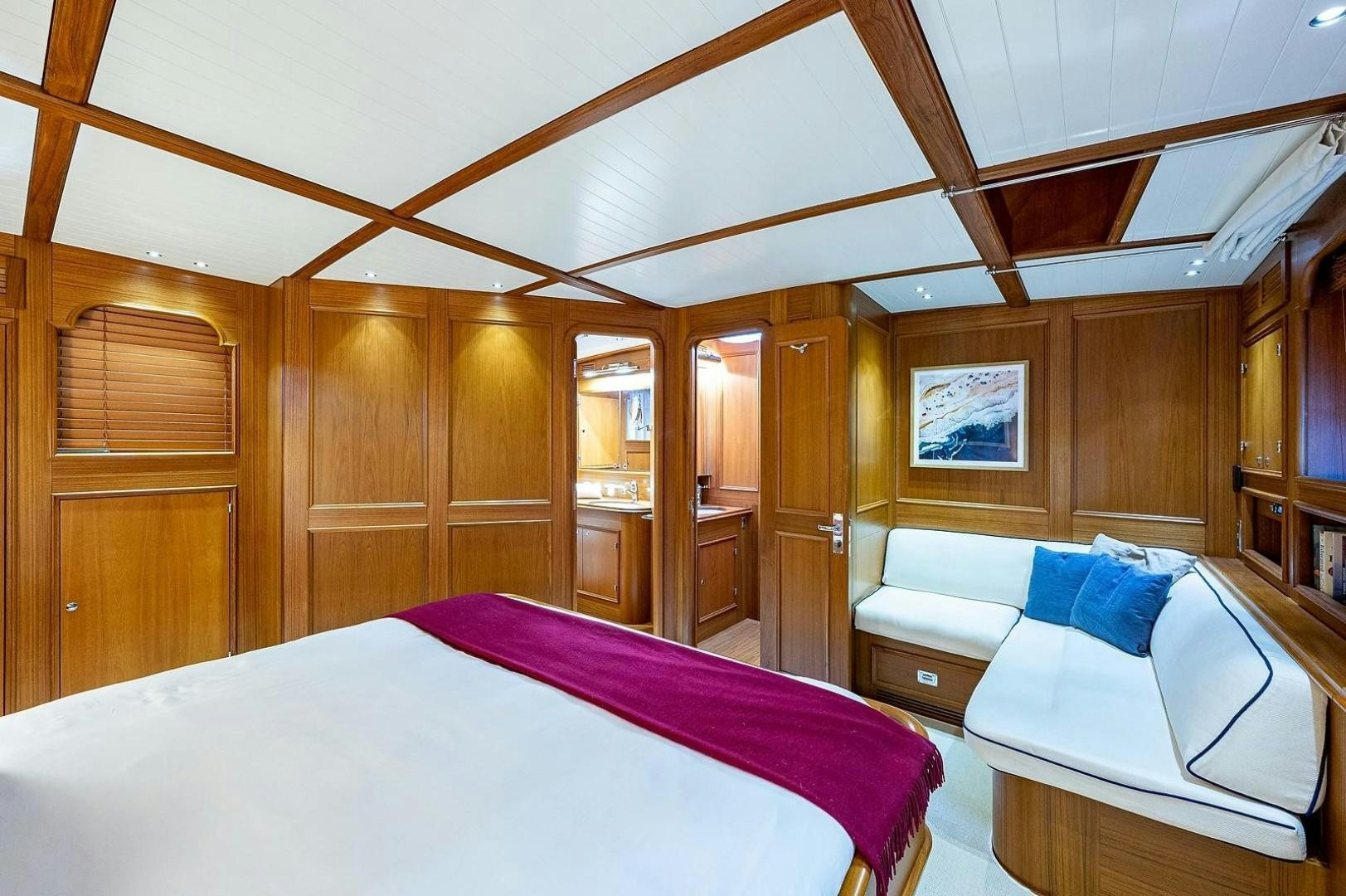 a room with two beds aboard ATALI Yacht for Sale