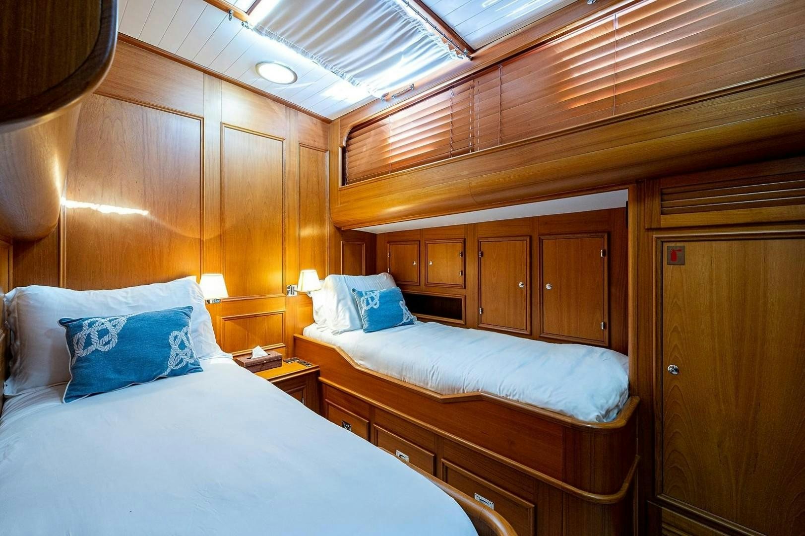 a couple of beds in a cabin aboard ATALI Yacht for Sale