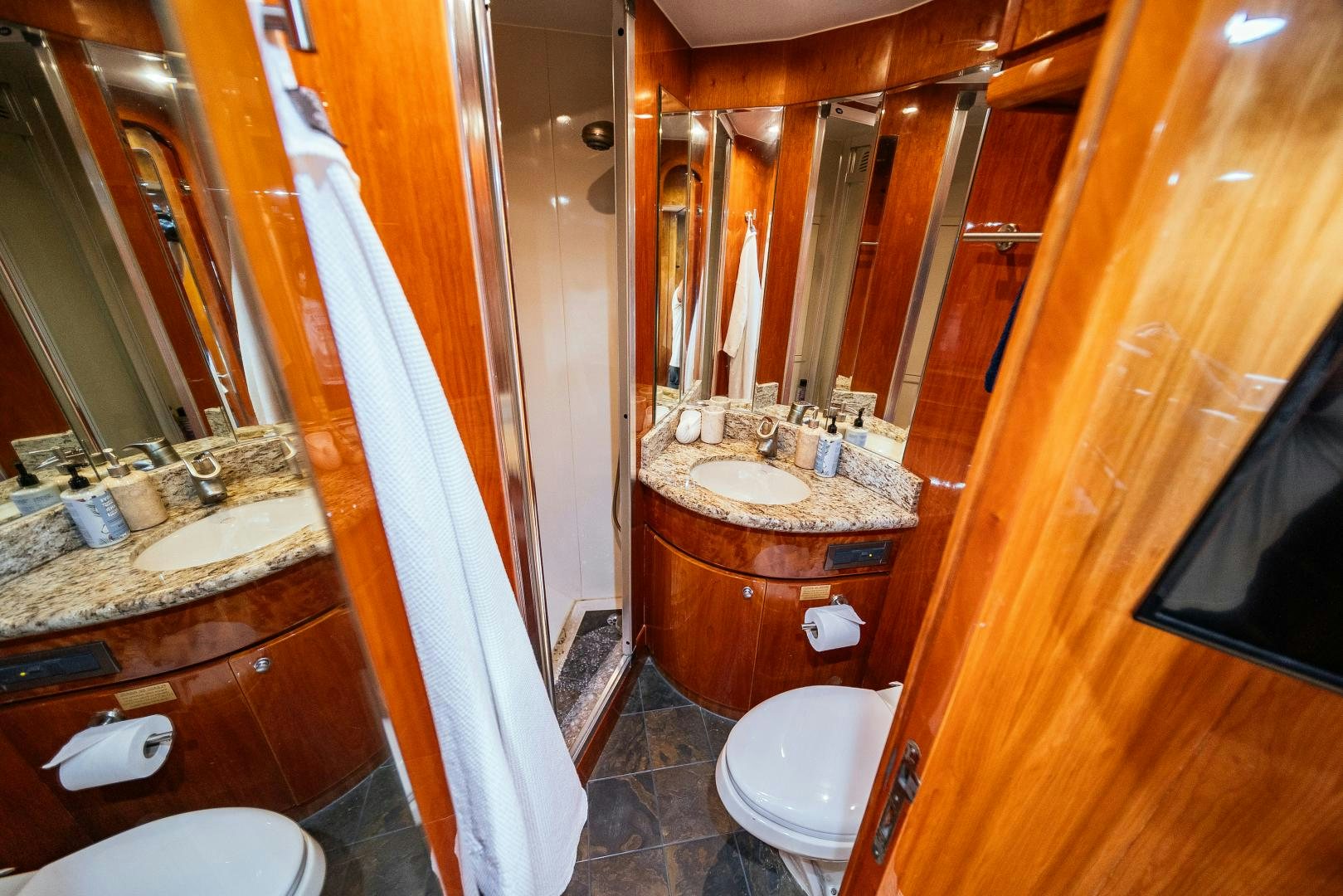 a bathroom with a sink and a toilet aboard ANDIAMO Yacht for Sale
