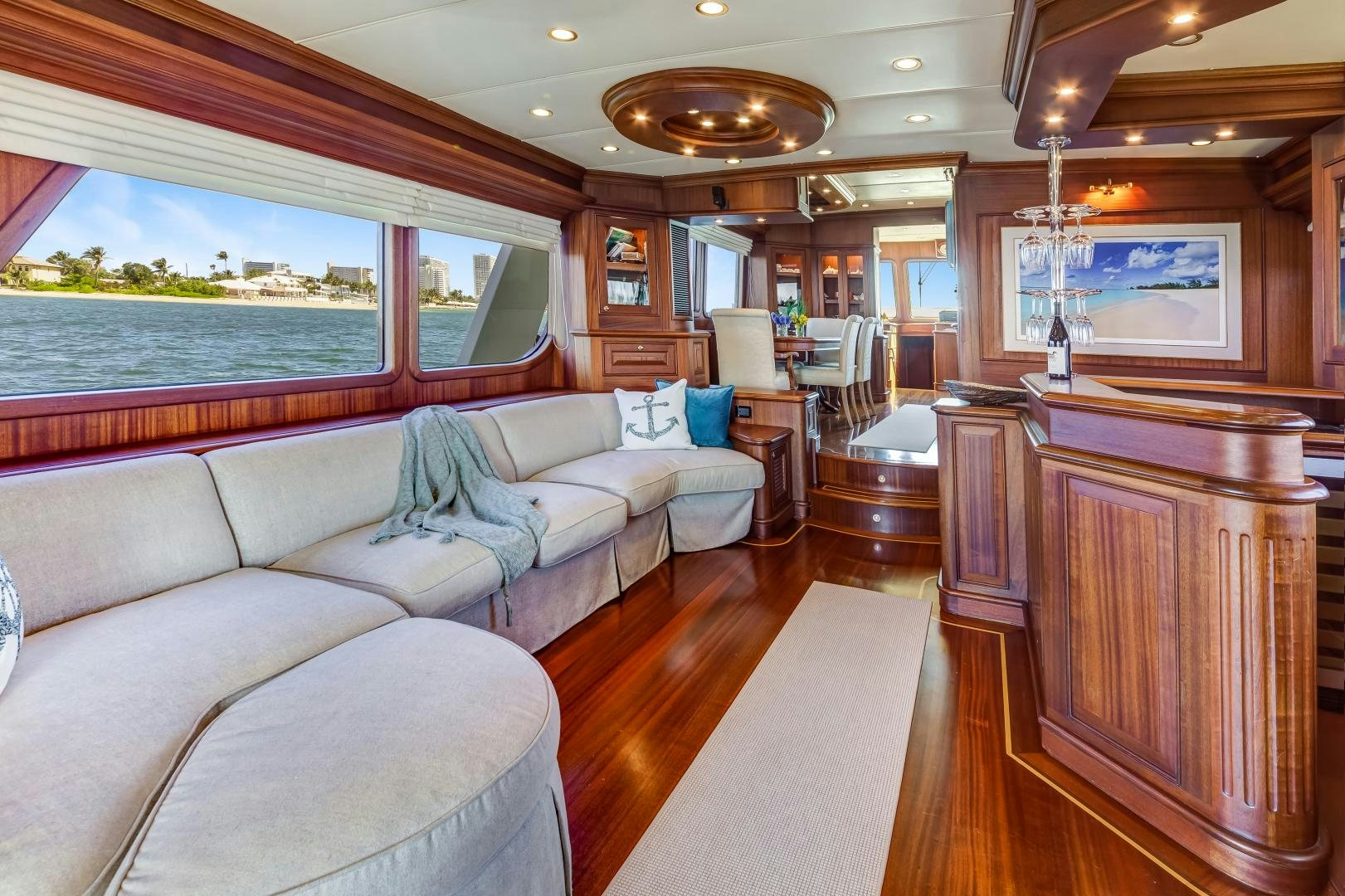 a living room with a large window aboard CHANSON II Yacht for Sale