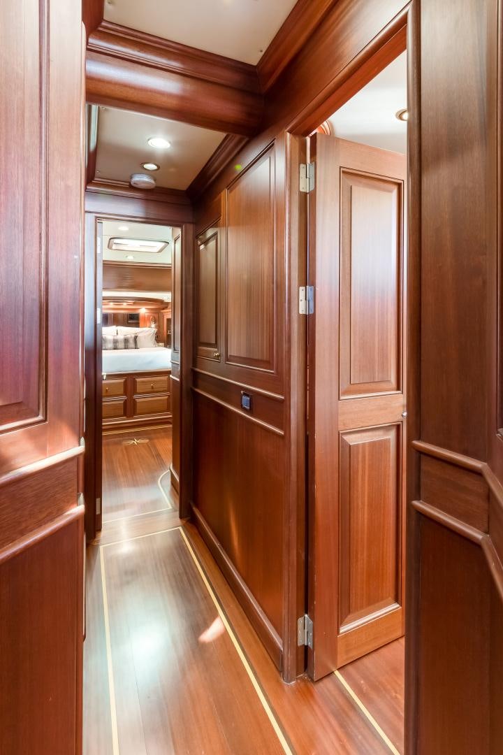 a room with wooden doors aboard CHANSON II Yacht for Sale