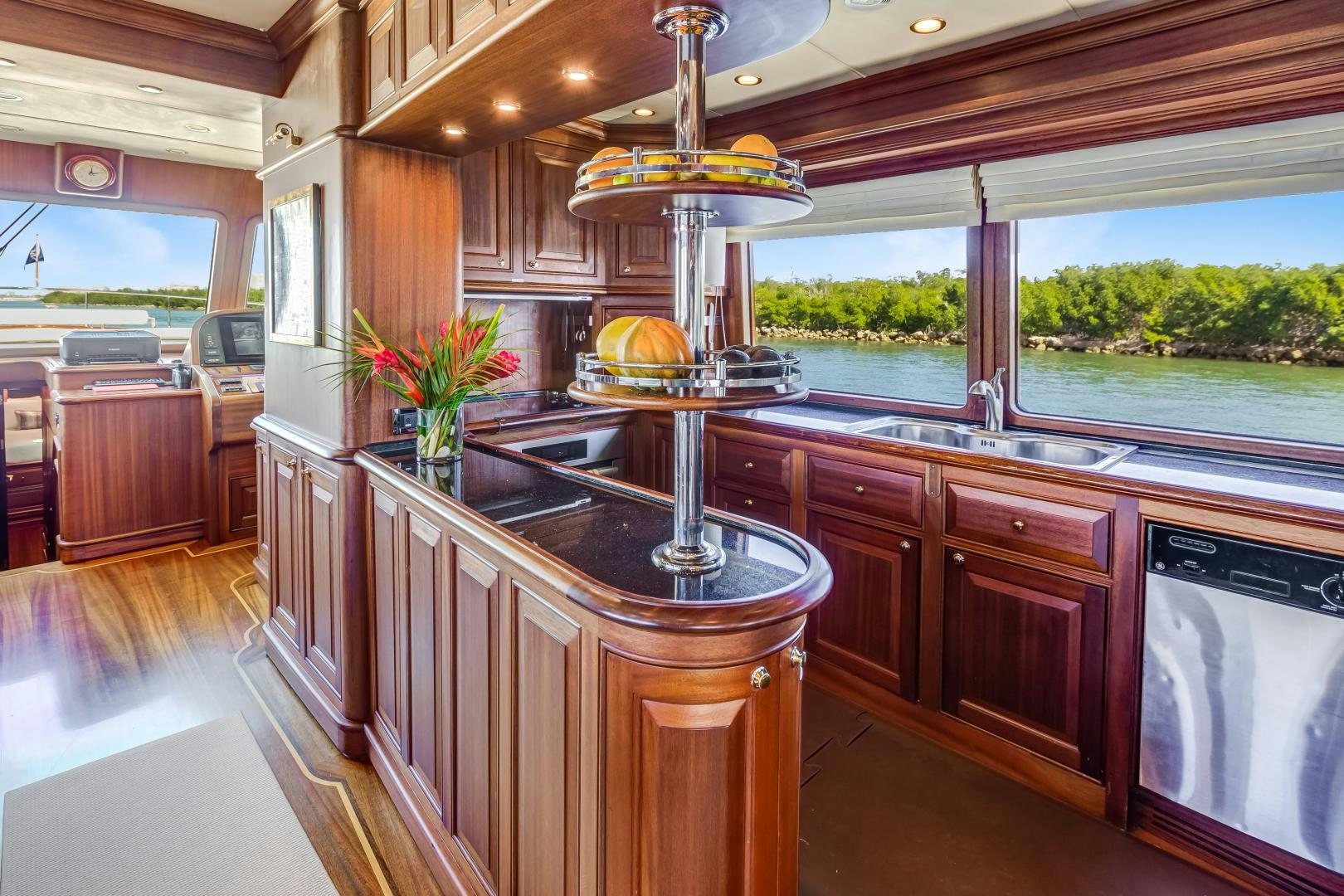 a kitchen with a large island aboard CHANSON II Yacht for Sale