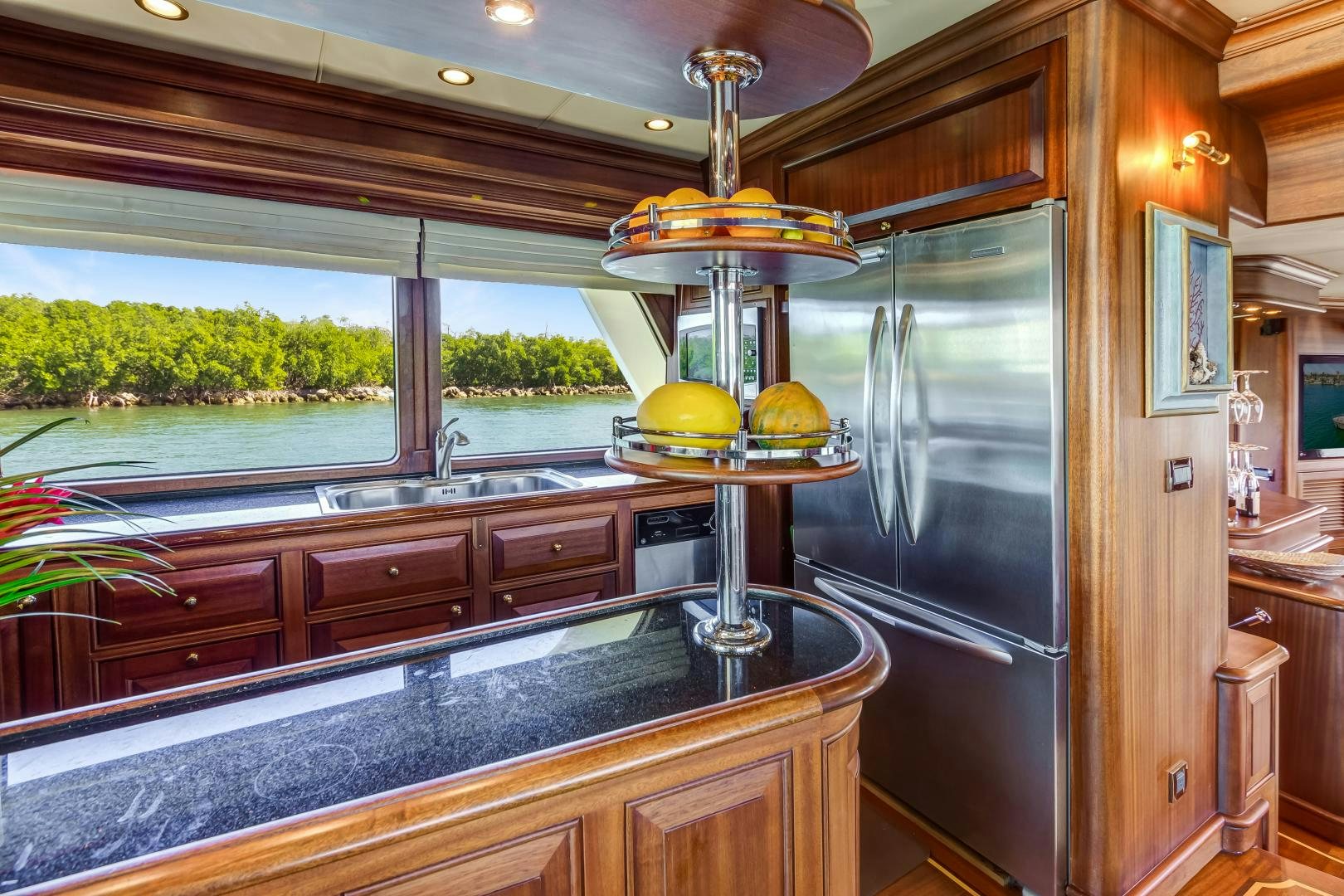 a kitchen with a large island aboard CHANSON II Yacht for Sale