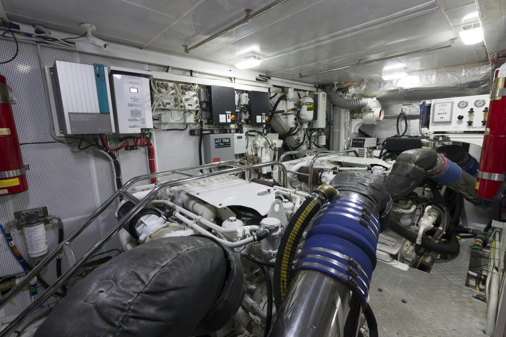 a room with a machine aboard CHANSON II Yacht for Sale