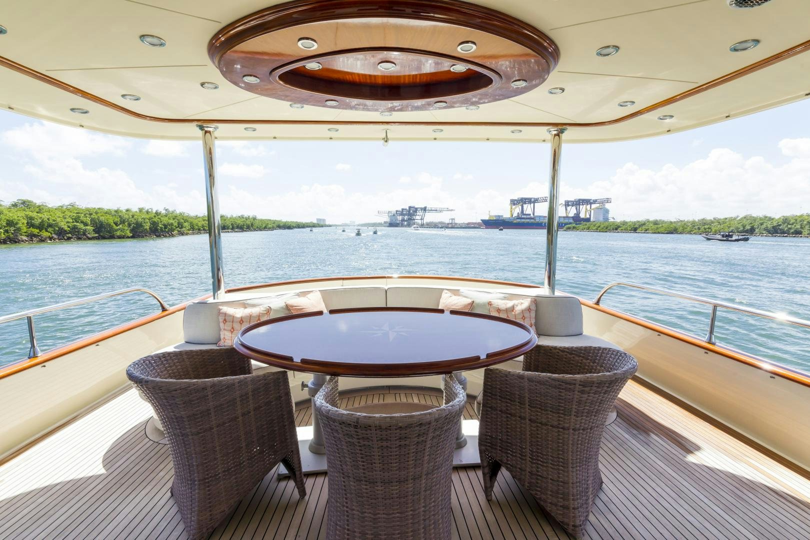 a table and chairs on a boat aboard CHANSON II Yacht for Sale