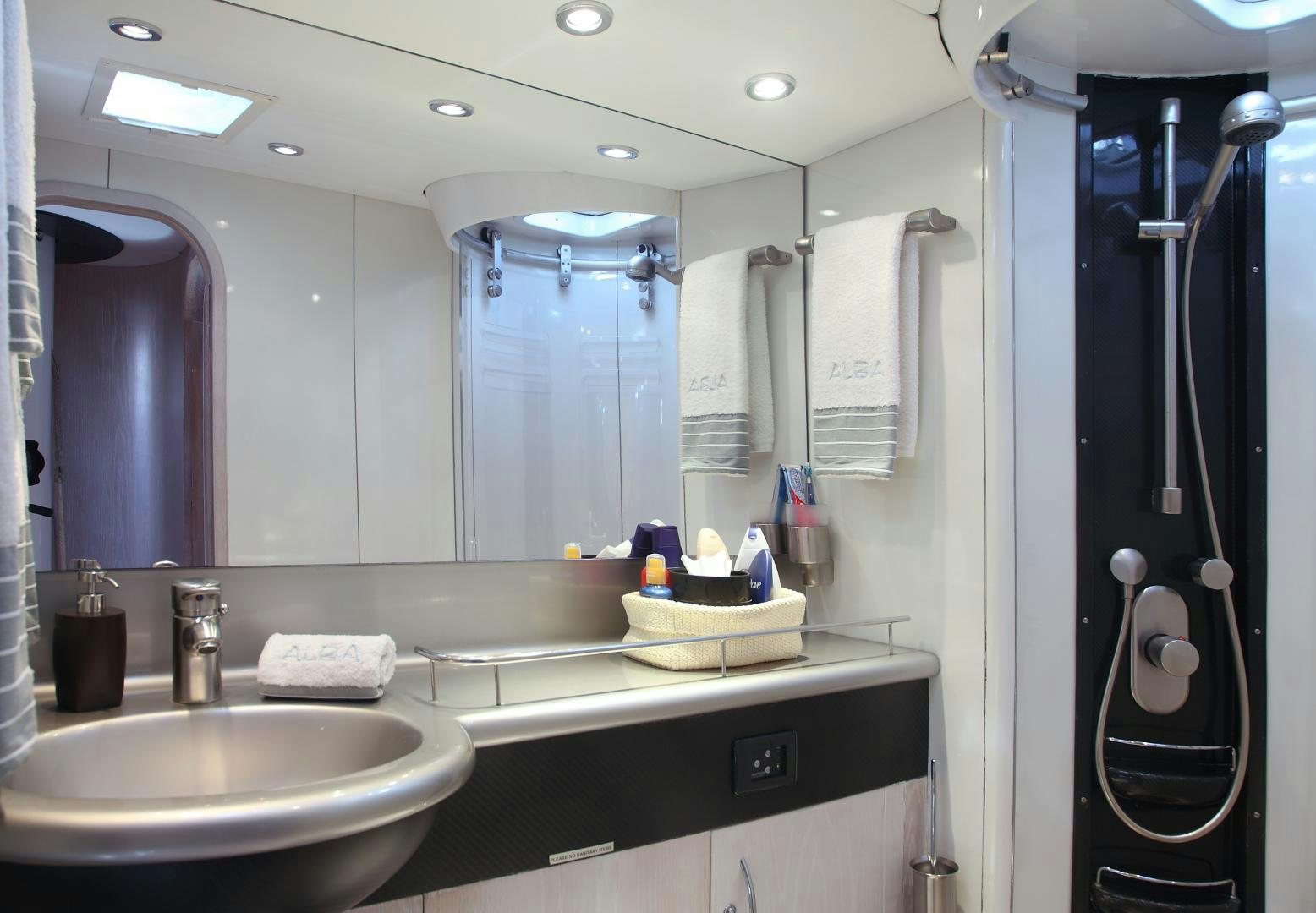 a bathroom with a large mirror aboard MARIA ALBA Yacht for Sale
