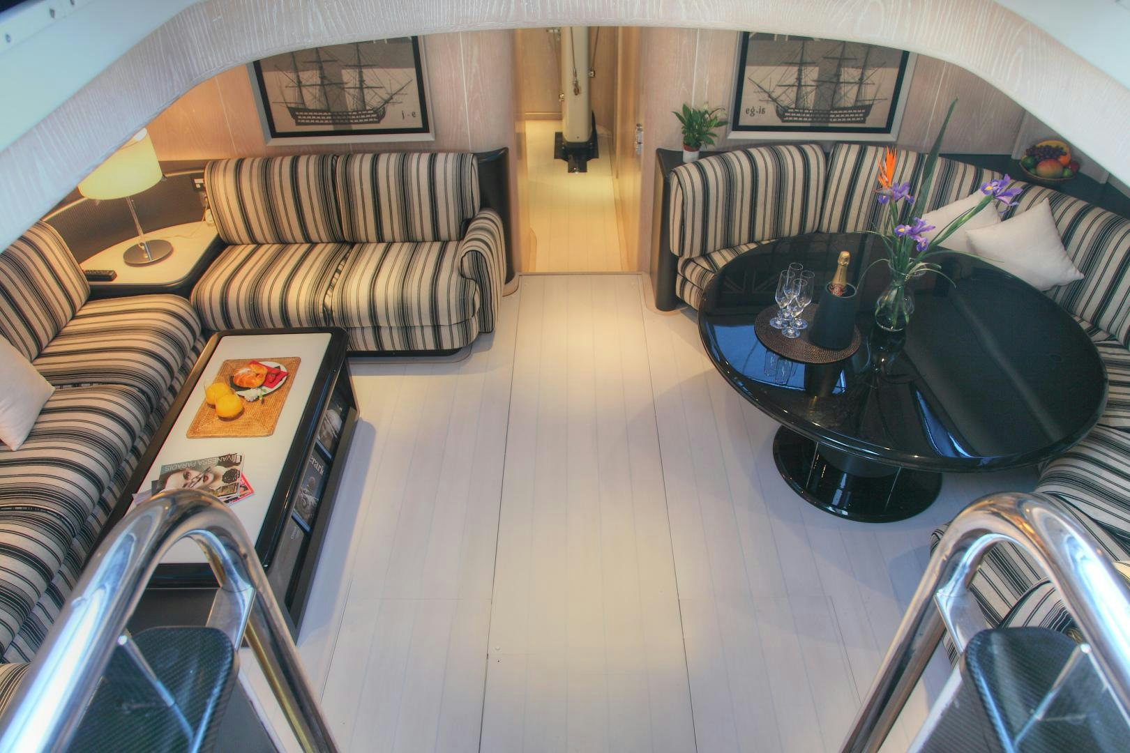 a living room with a couch and a coffee table aboard MARIA ALBA Yacht for Sale