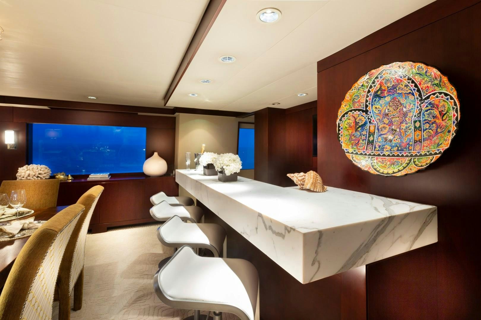 a room with a large mirror aboard CRU Yacht for Sale