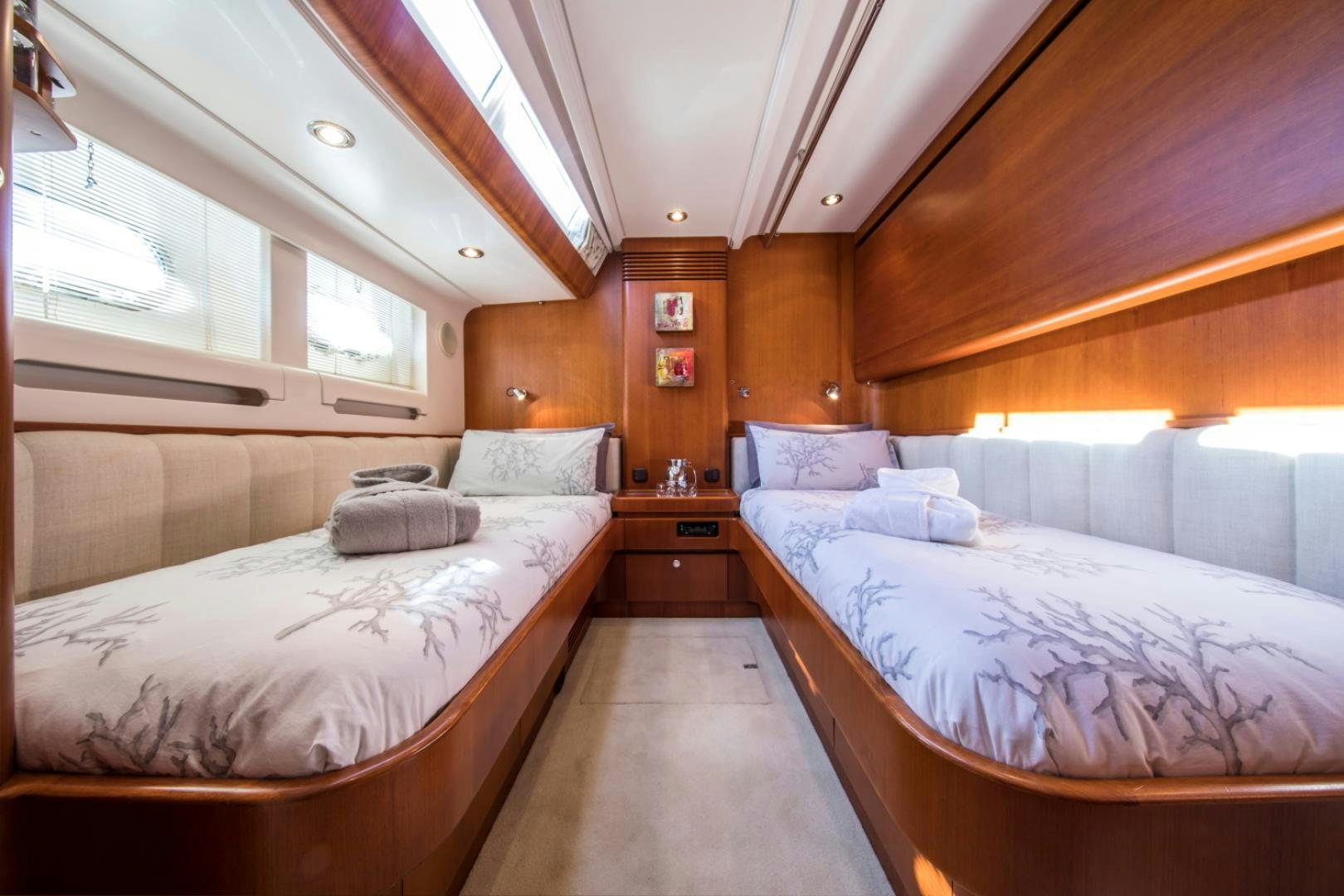 a room with two beds aboard ALTA MAREA Yacht for Sale