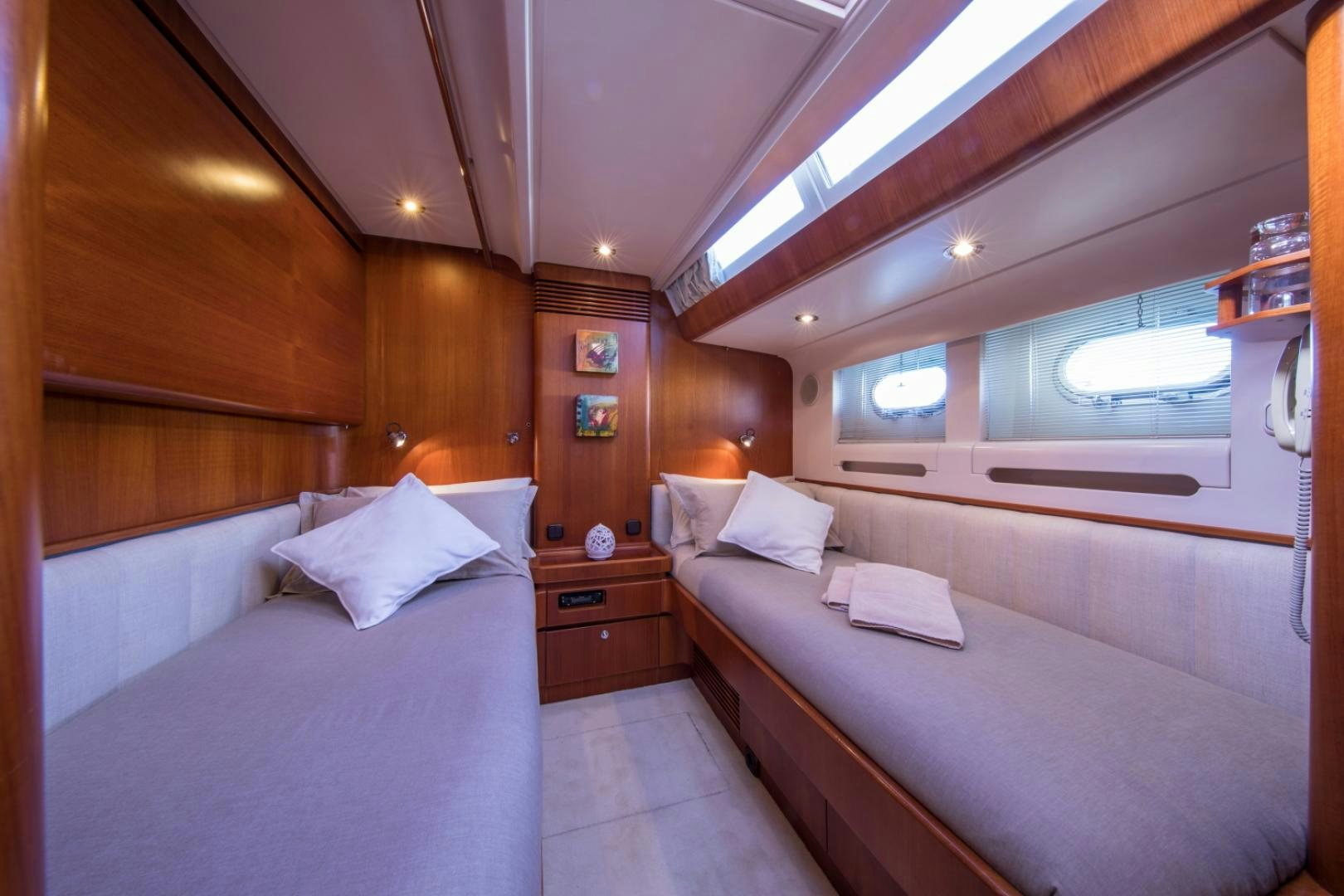 a room with two beds aboard ALTA MAREA Yacht for Sale