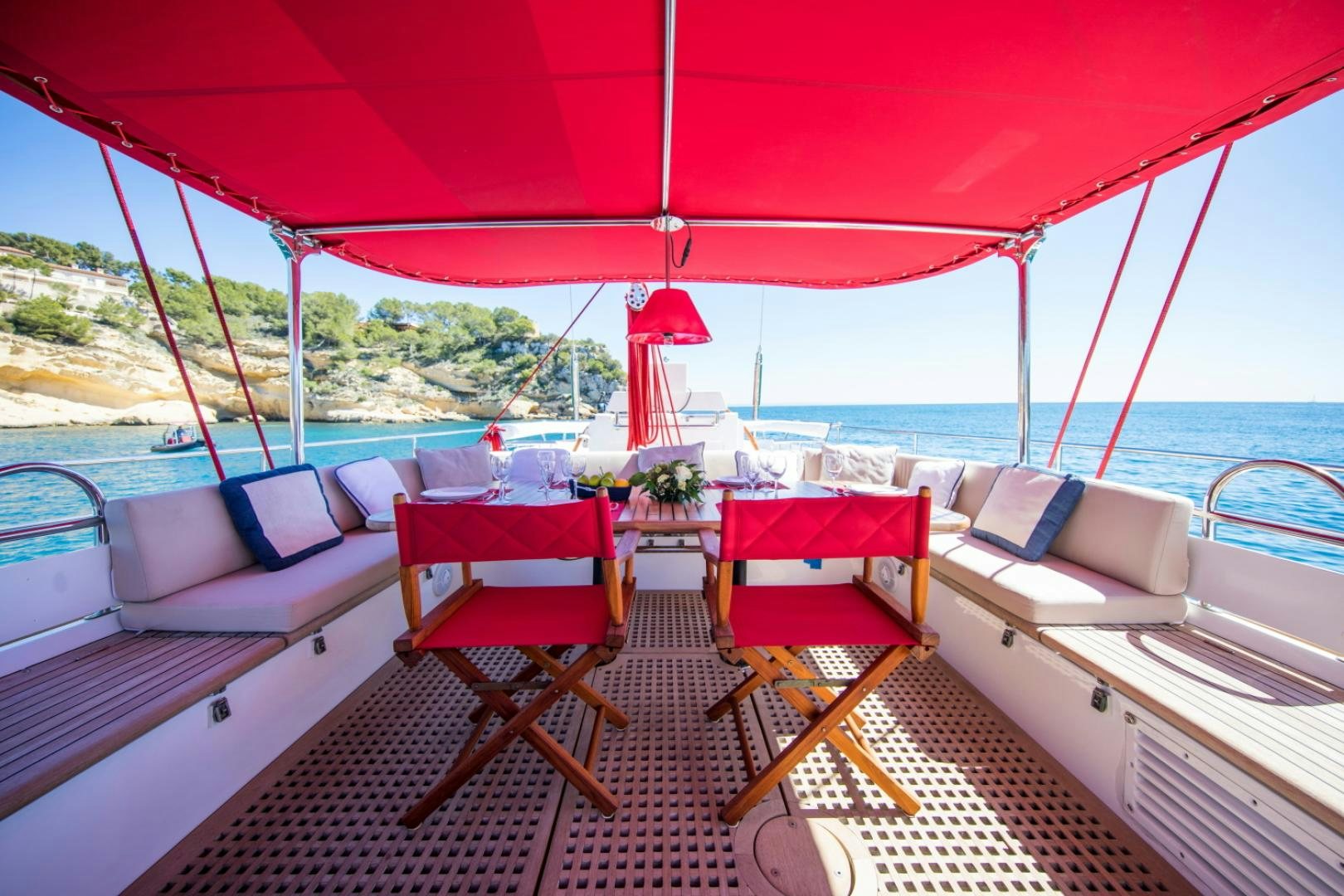 a boat with chairs on the deck aboard ALTA MAREA Yacht for Sale