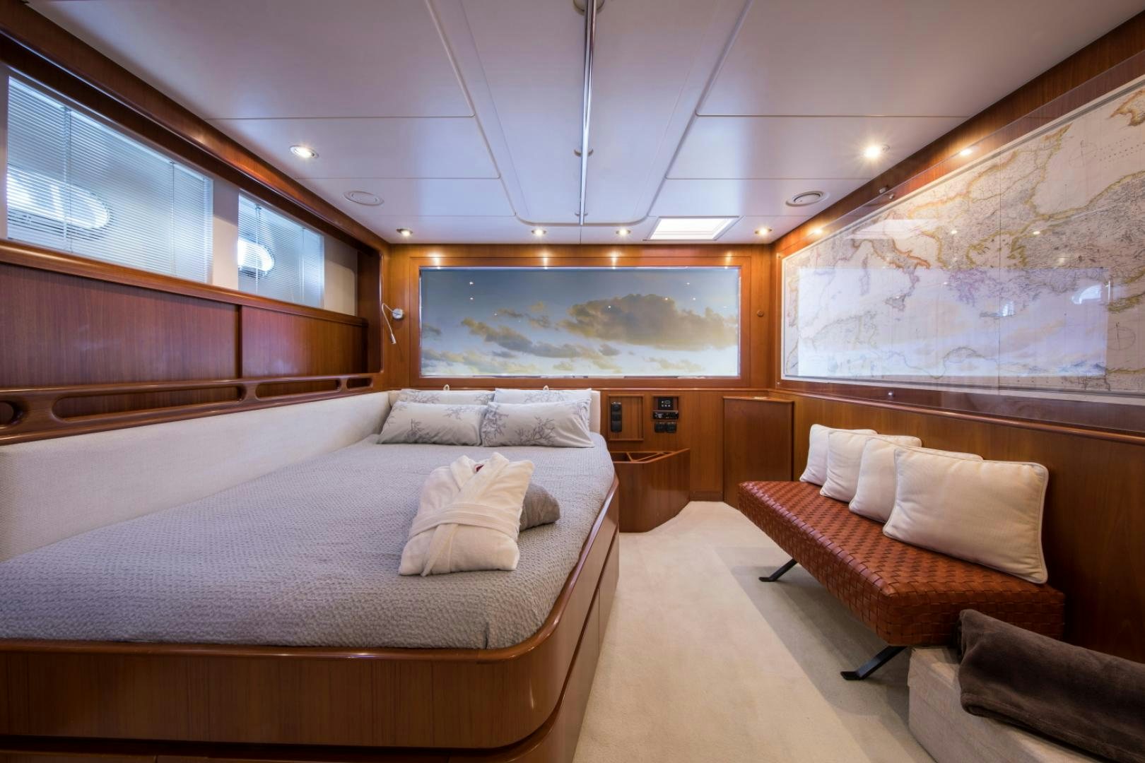 a room with a bed and a couch aboard ALTA MAREA Yacht for Sale