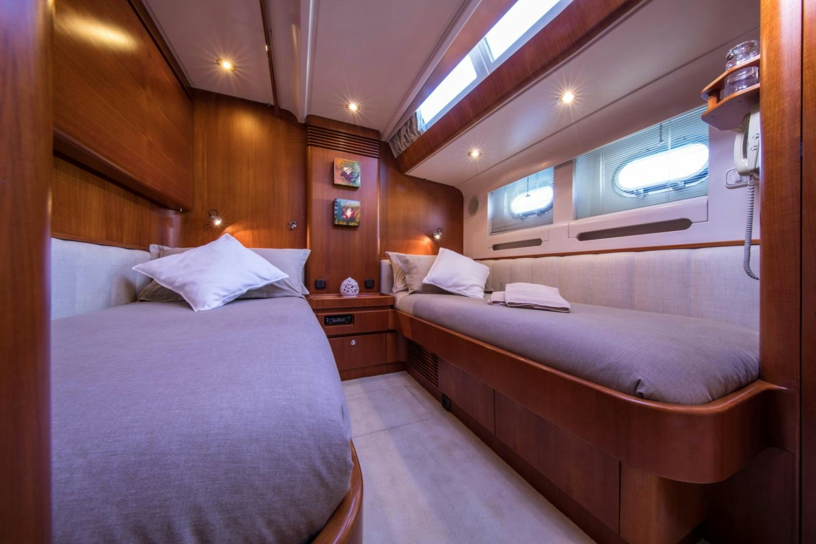a room with two beds aboard ALTA MAREA Yacht for Sale
