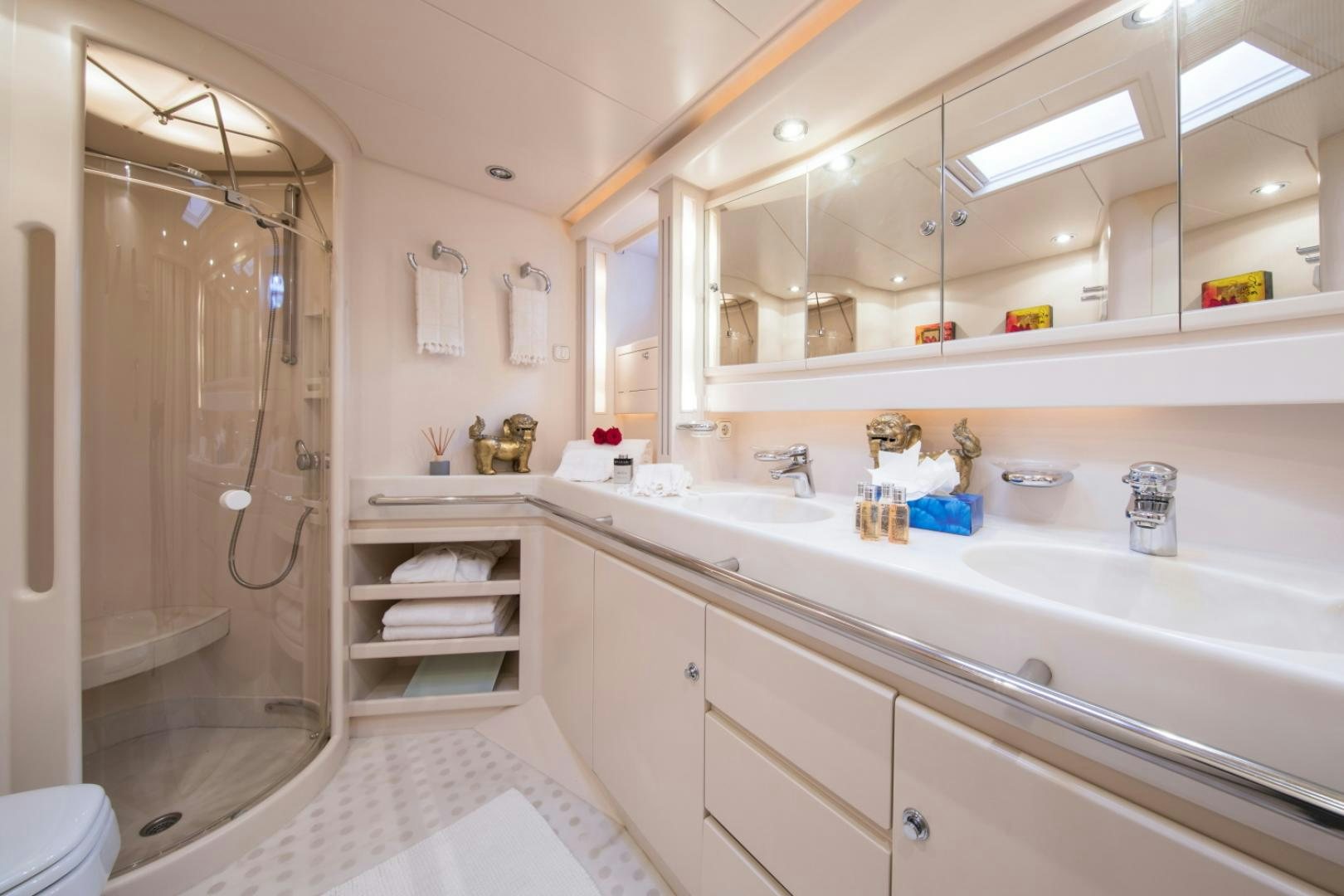 a bathroom with a shower and sink aboard ALTA MAREA Yacht for Sale