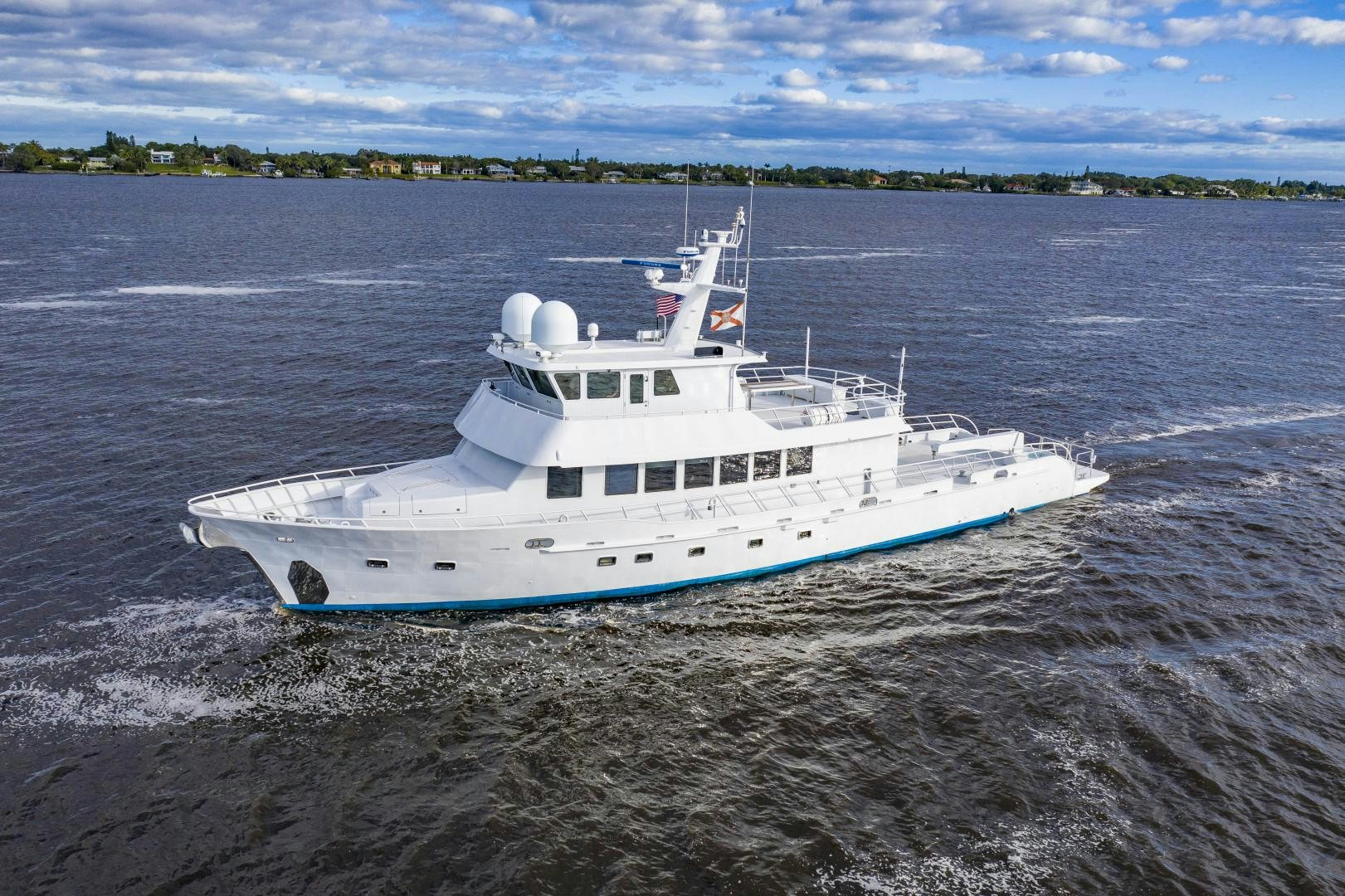 a boat on the beach aboard RESET Yacht for Sale