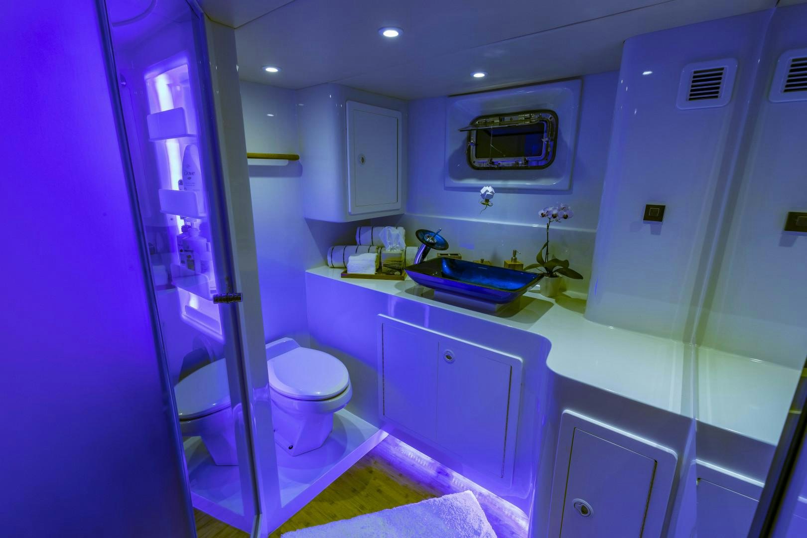 a bathroom with a sink and a toilet aboard RESET Yacht for Sale