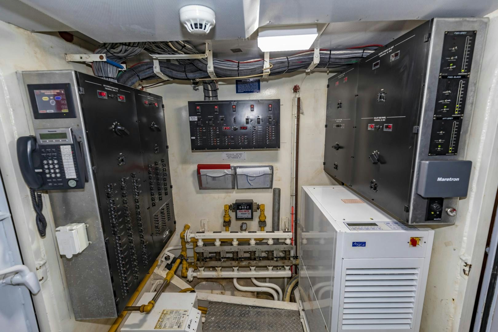 a room with several machines aboard RESET Yacht for Sale