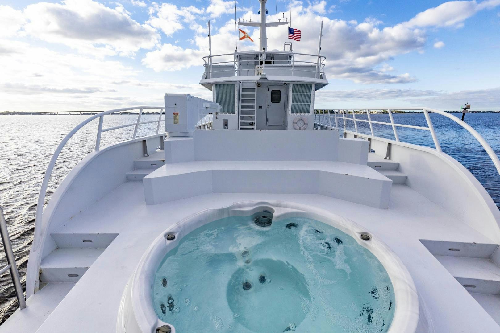 a large white boat aboard RESET Yacht for Sale