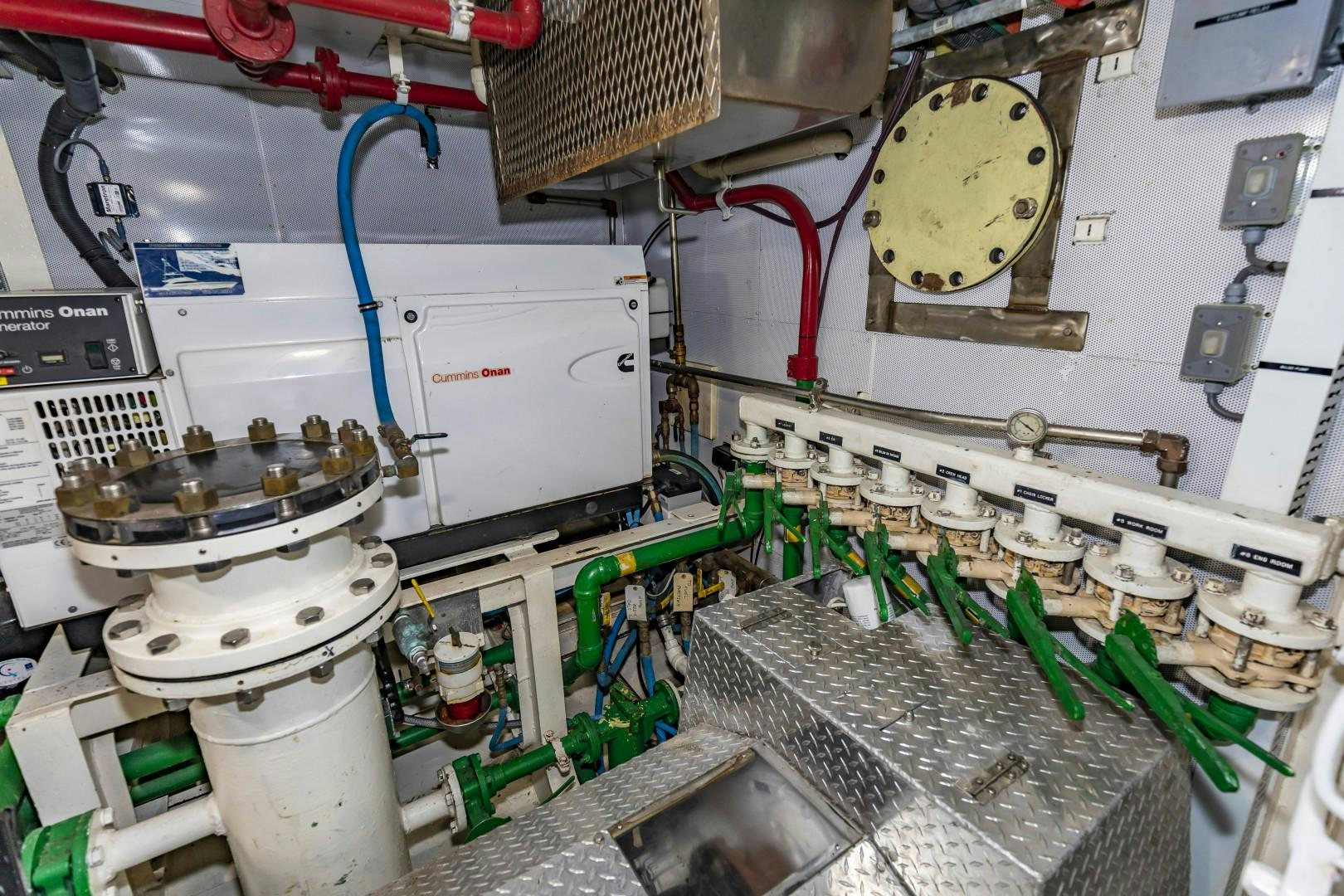 a room with machinery and pipes aboard RESET Yacht for Sale