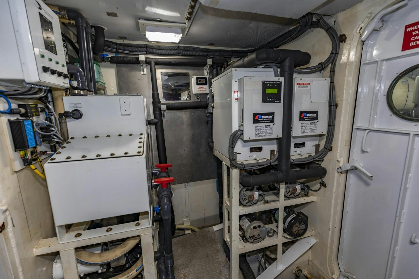 a room with machinery aboard RESET Yacht for Sale