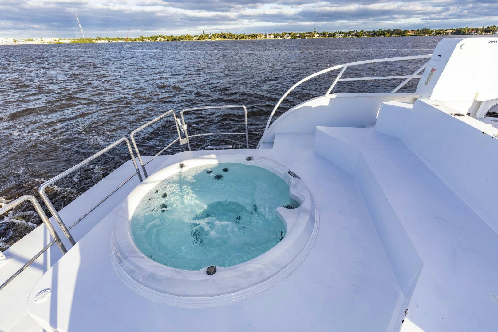 a large pool of water aboard RESET Yacht for Sale