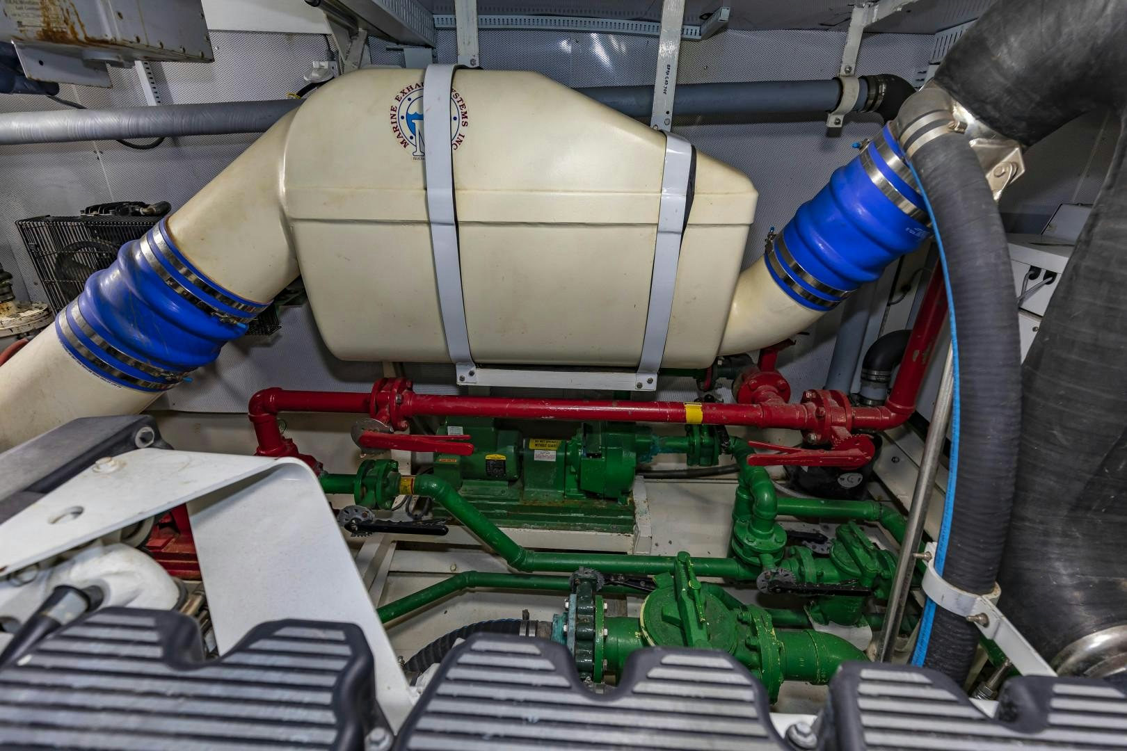 a person wearing a white glove working on a machine aboard RESET Yacht for Sale