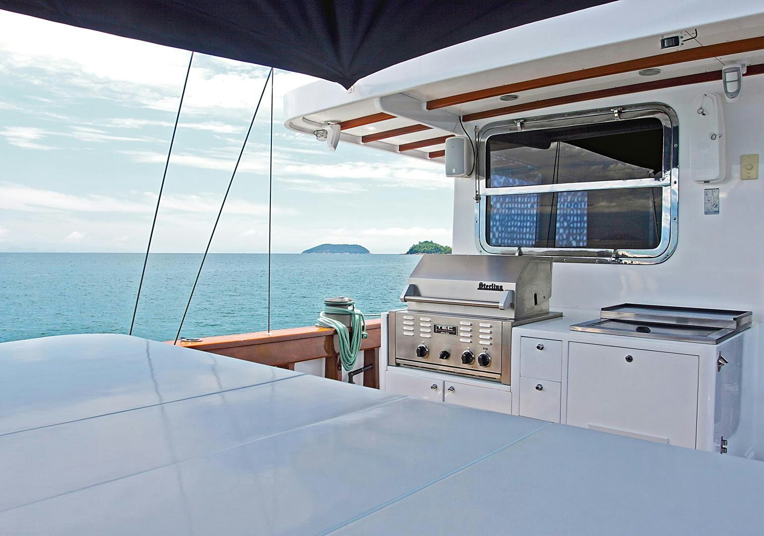 a boat with a sink and stove aboard MESTRE BELO Yacht for Sale