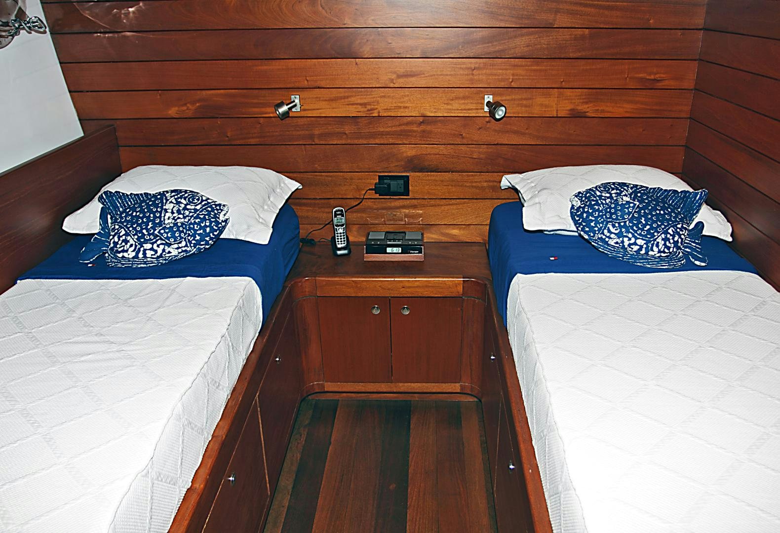 a couple of beds in a room aboard MESTRE BELO Yacht for Sale