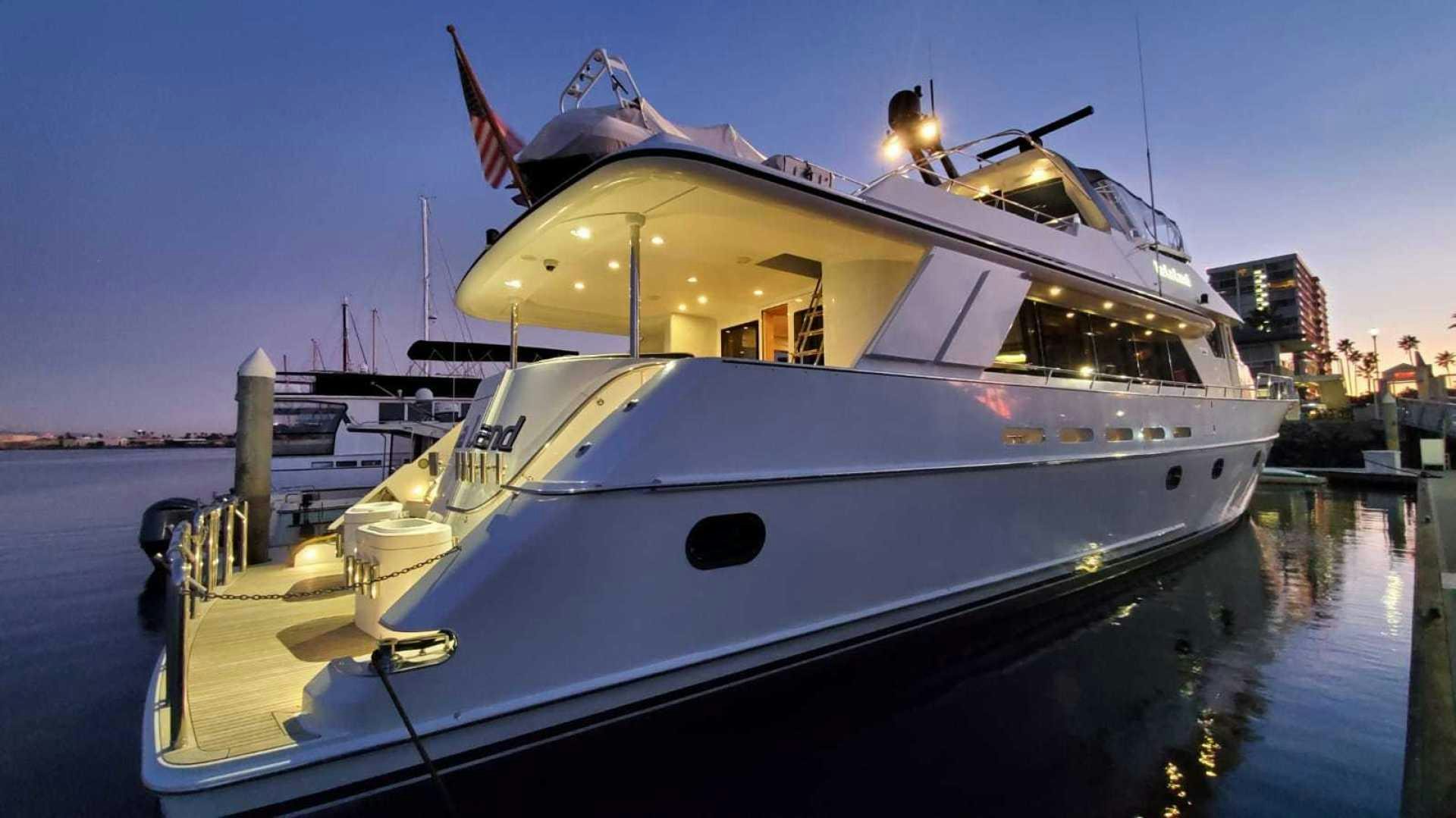 a large white boat in the water aboard LA LA LAND Yacht for Sale