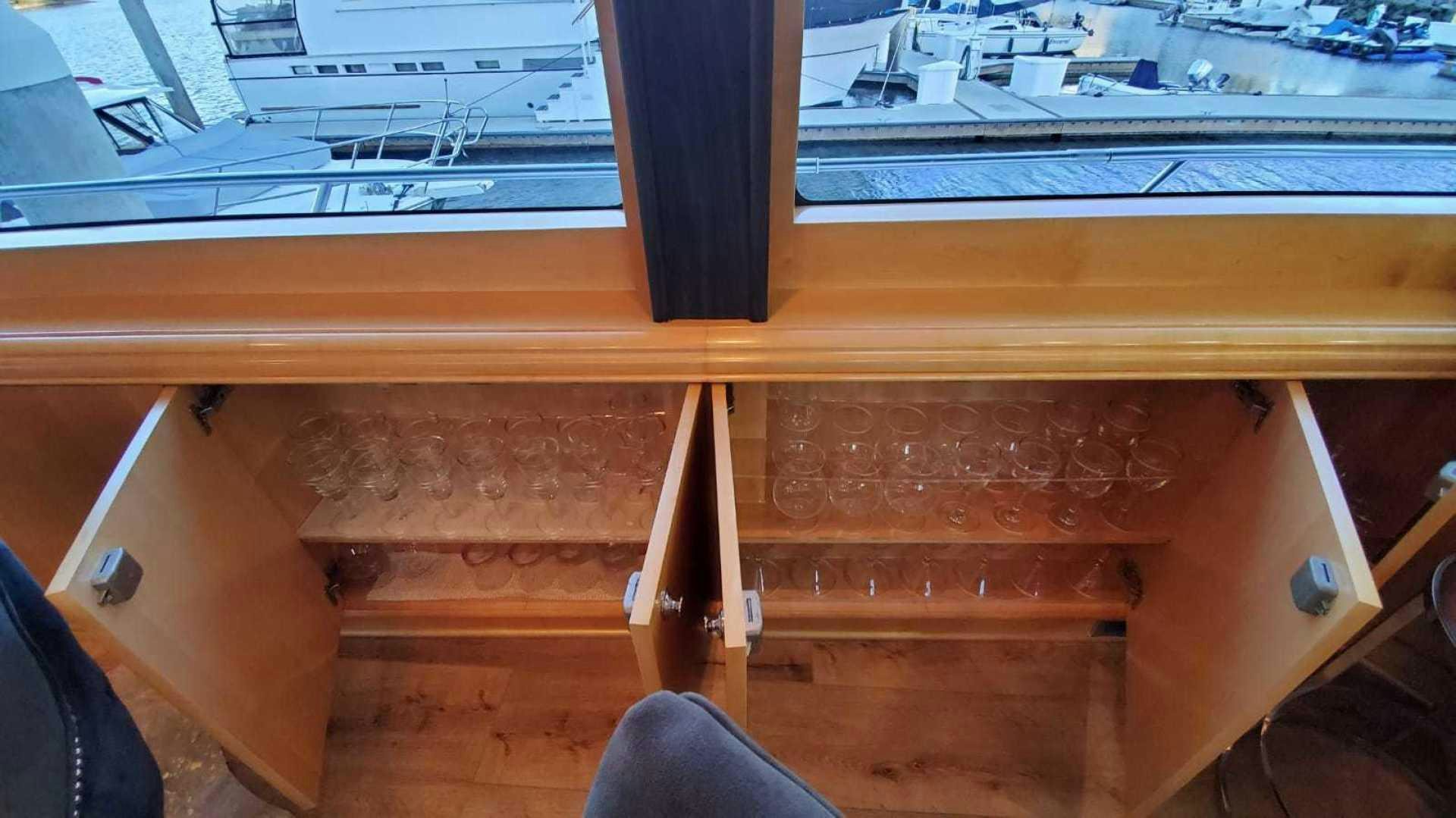 a wooden shelf with a vent aboard LA LA LAND Yacht for Sale