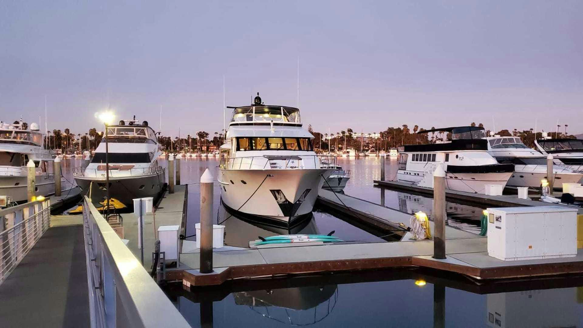 a group of boats are parked at a dock aboard LA LA LAND Yacht for Sale