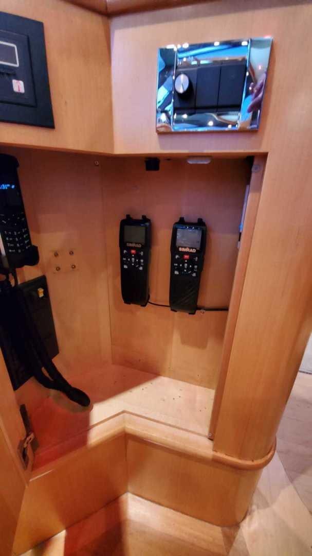 a phone on a box aboard LA LA LAND Yacht for Sale