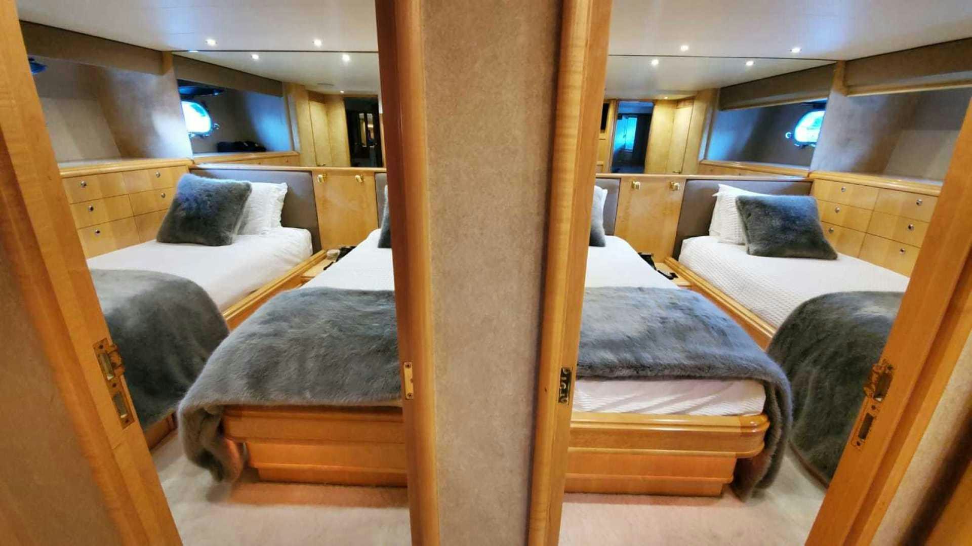 a room with bunk beds aboard LA LA LAND Yacht for Sale