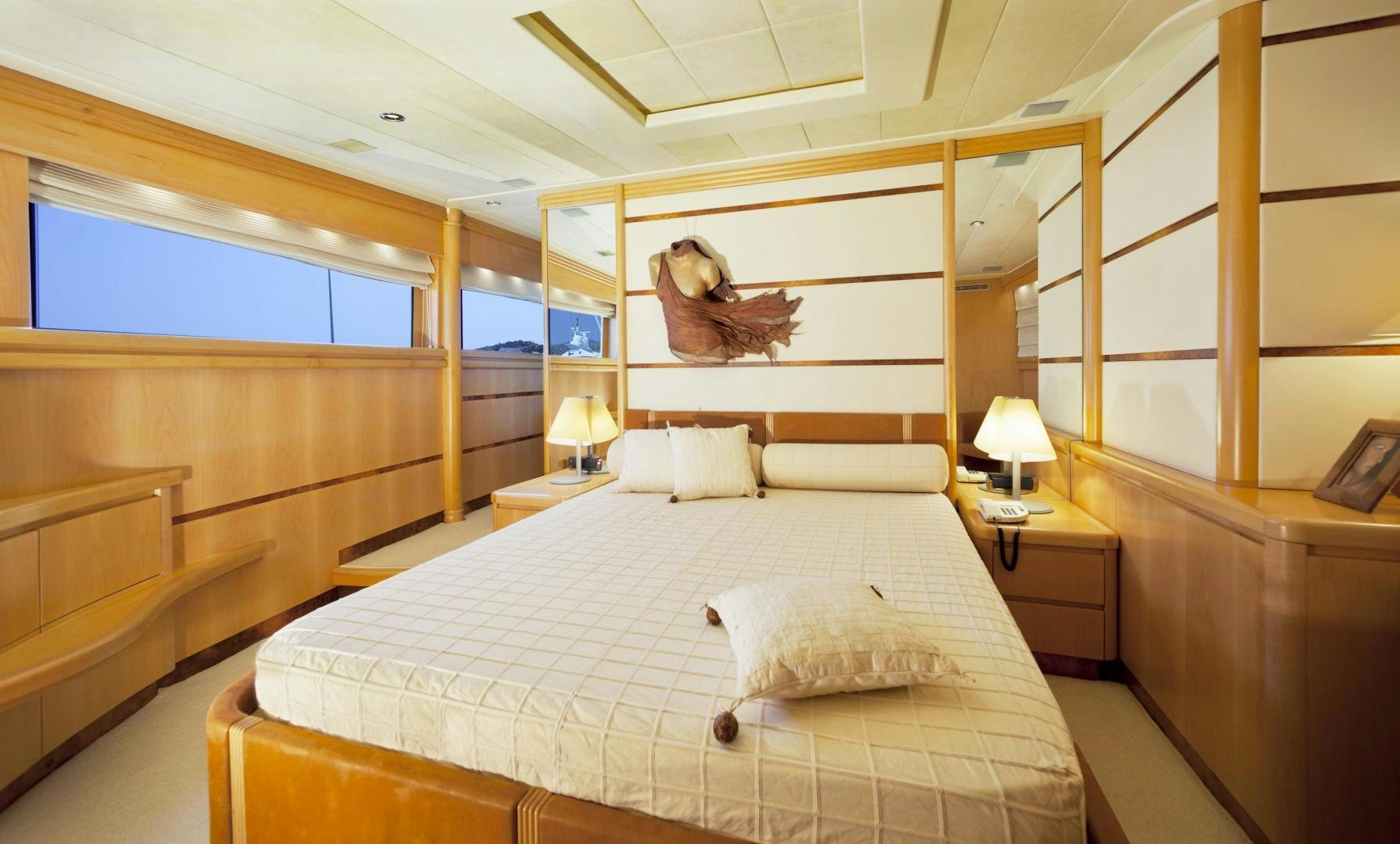 a bedroom with a large bed aboard LADY MOH Yacht for Sale