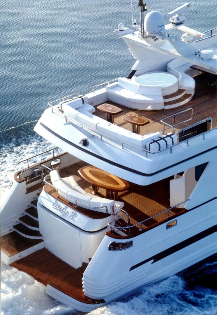 a couple of boats sit on a dock aboard LADY MOH Yacht for Sale