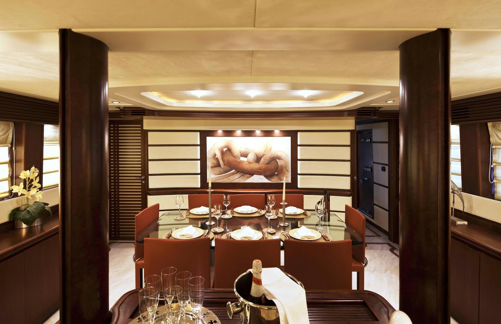 a large room with tables and chairs aboard LADY MOH Yacht for Sale