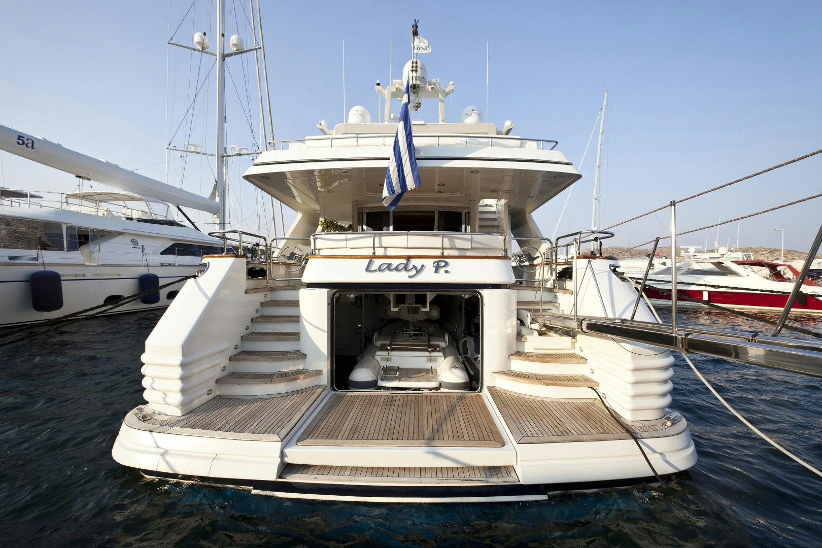 a boat docked at a pier aboard LADY MOH Yacht for Sale