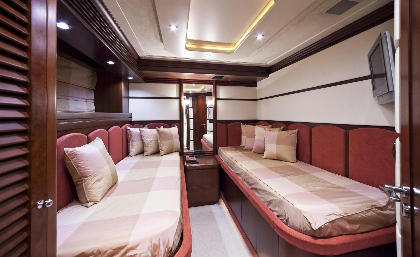 a room with two beds aboard LADY MOH Yacht for Sale