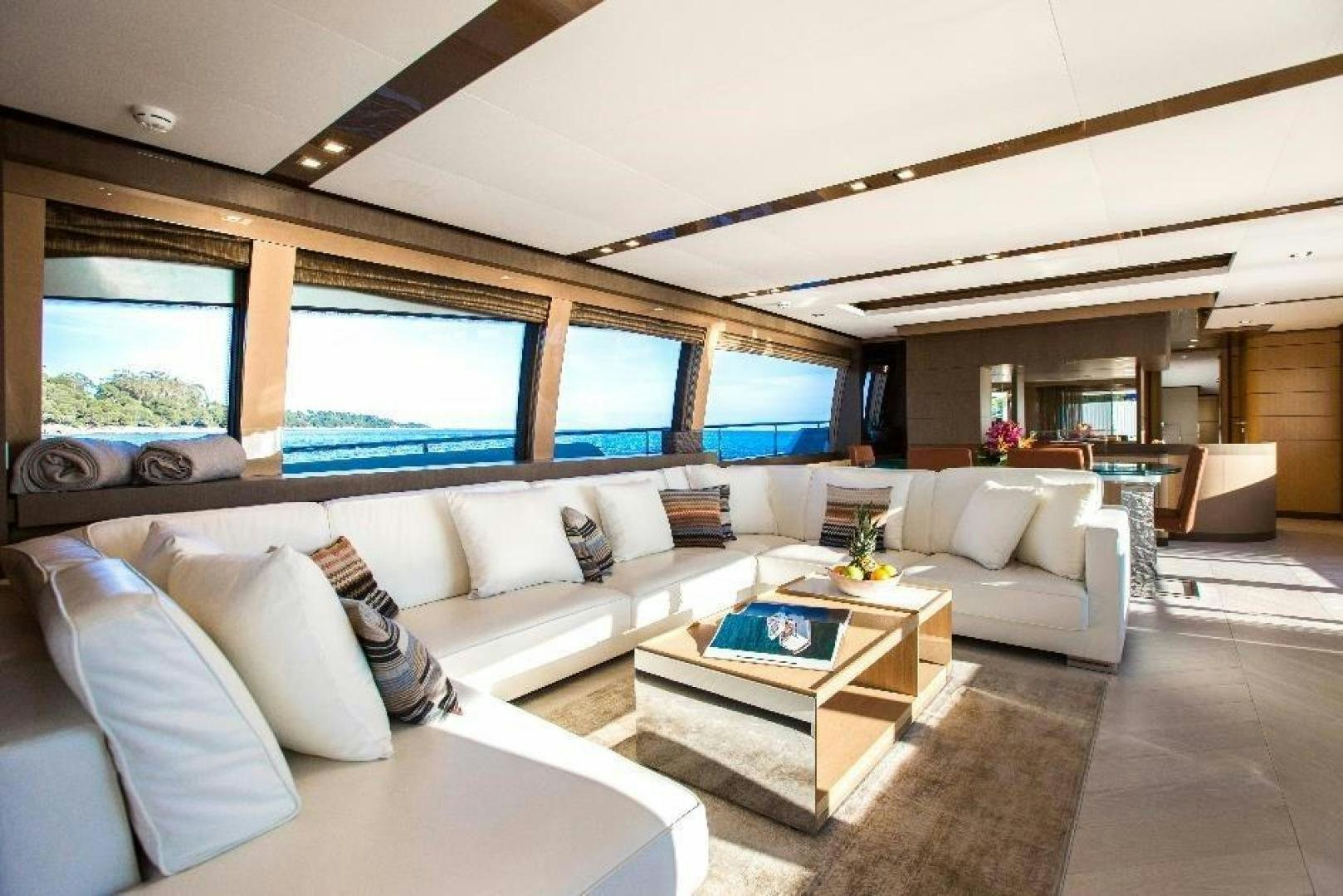 a living room with a large window aboard HAPPY BLUE II Yacht for Sale