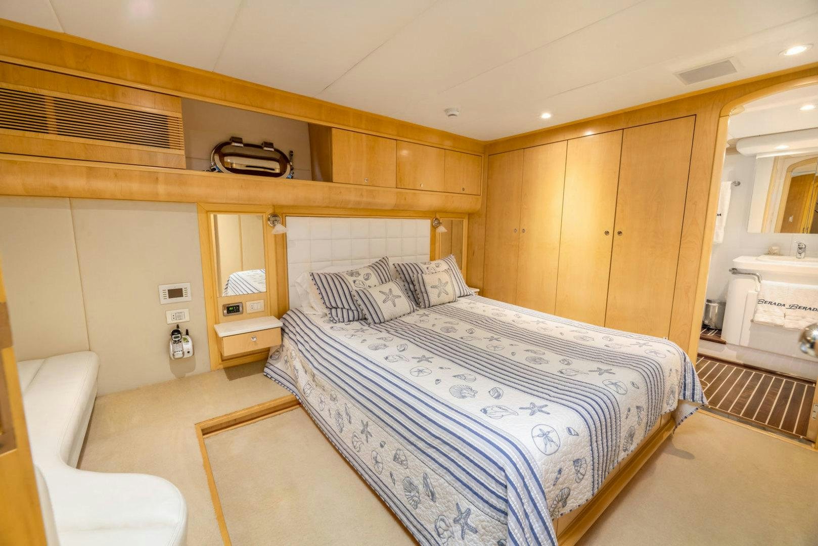 a bed in a room aboard BERADA Yacht for Sale