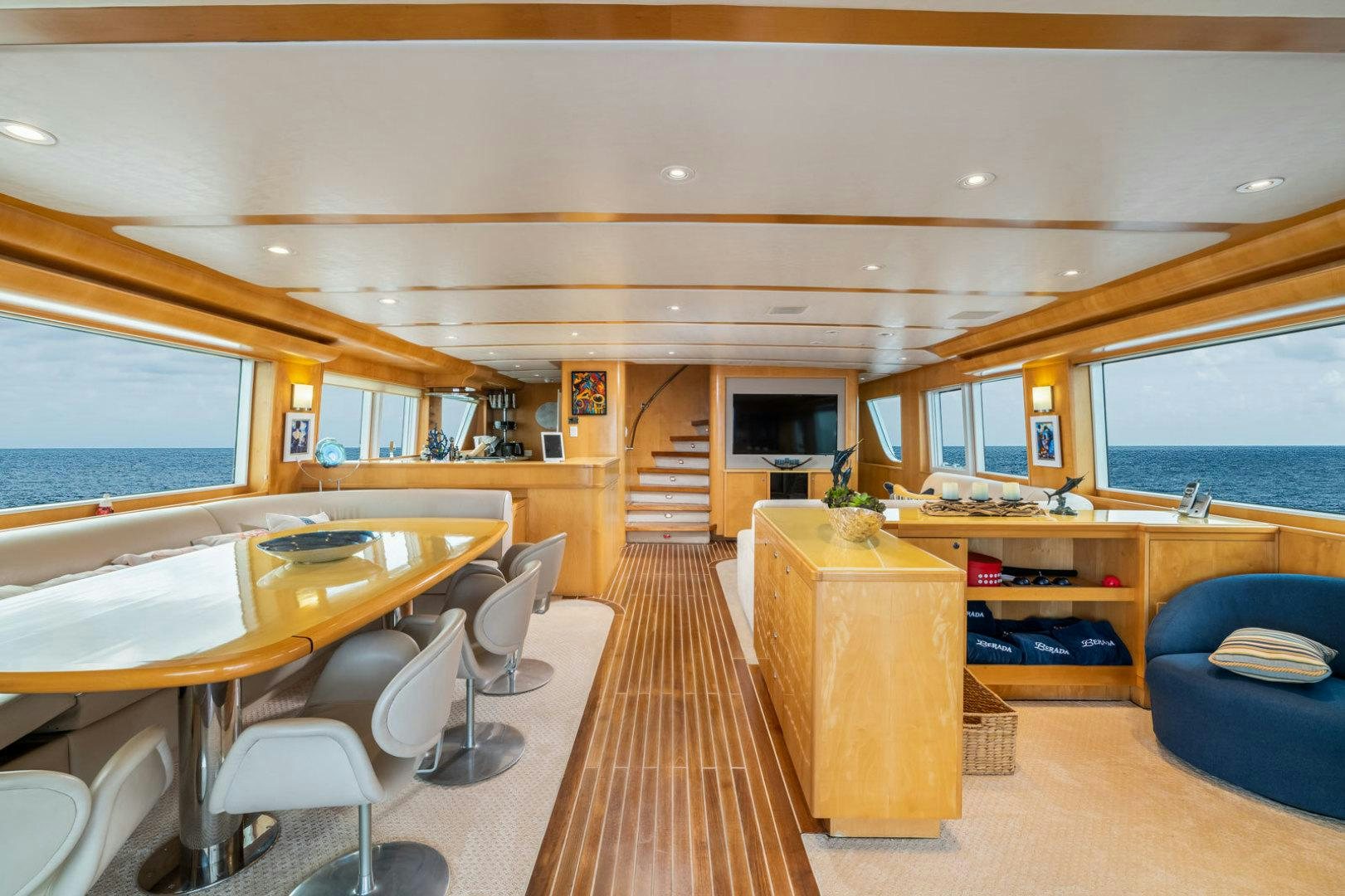 a room with a wood floor and a wood floor aboard BERADA Yacht for Sale