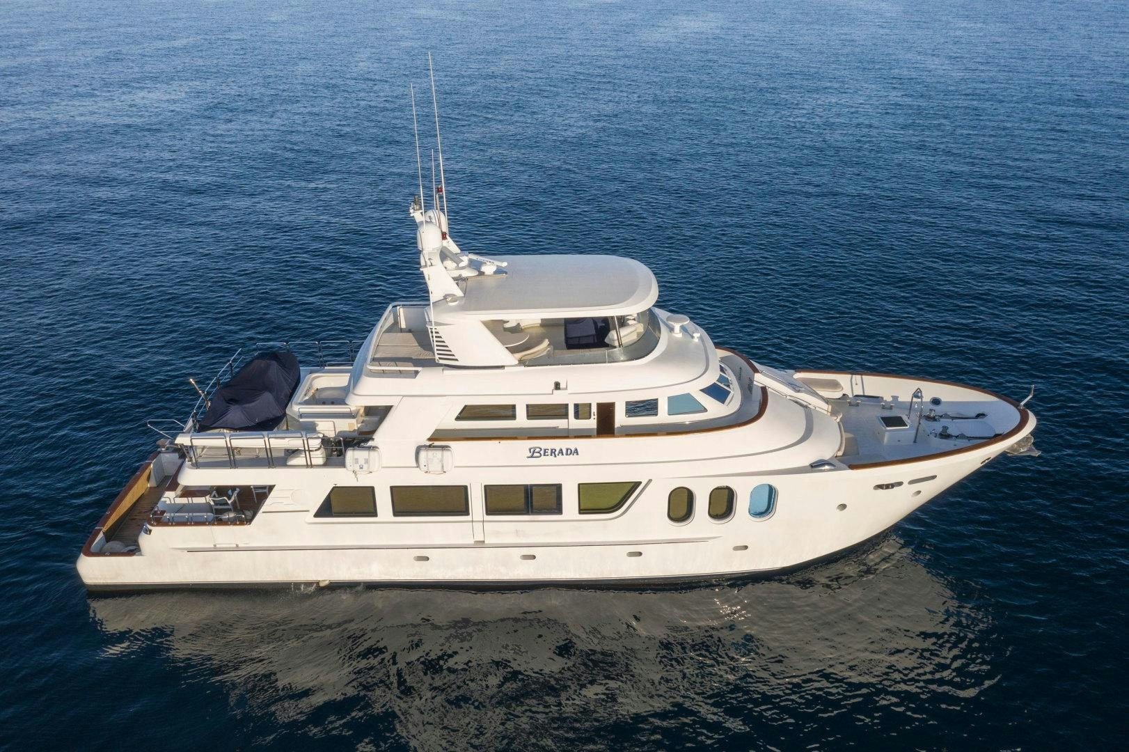 a white yacht in the water aboard BERADA Yacht for Sale